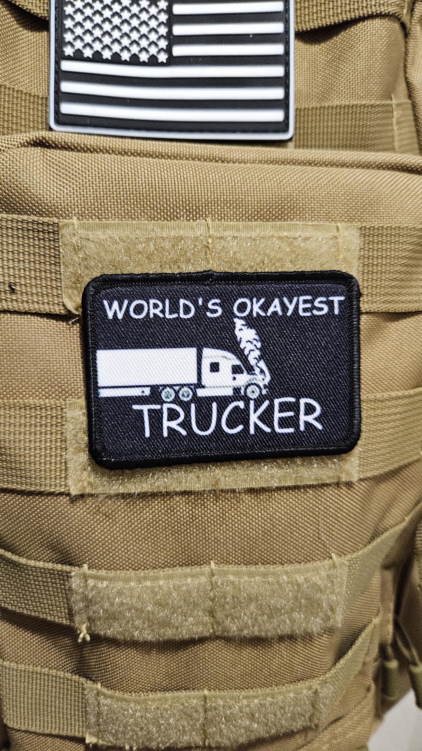 World's okayest trucker blue collar 2"x3" morale patch with hook and loop backing