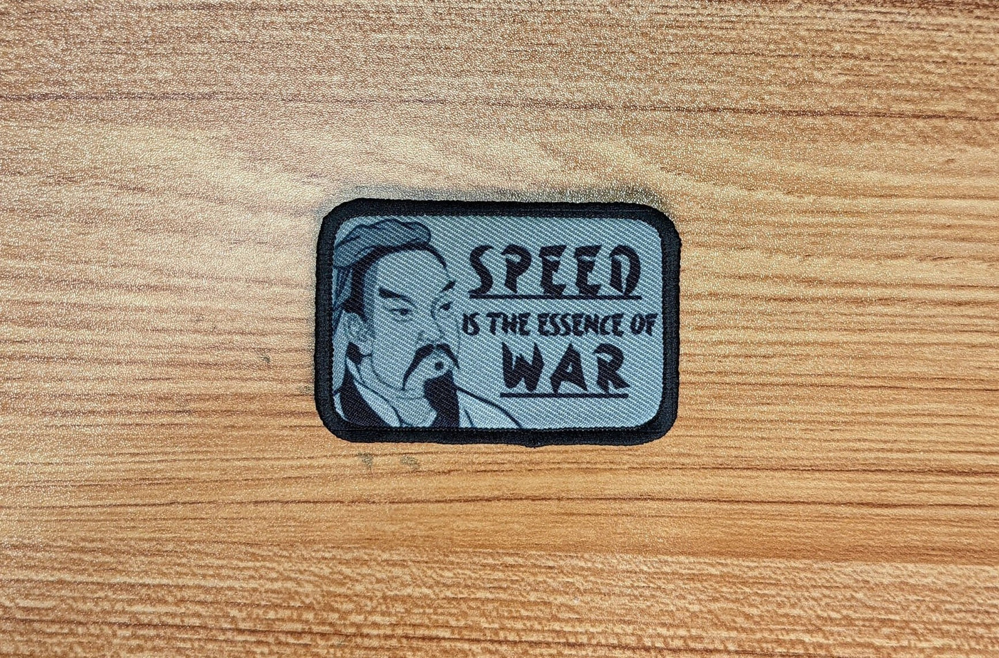 Sun Tzu Art of War Speed is the Essence of War 2"x3" removable morale patch with hook and loop backing