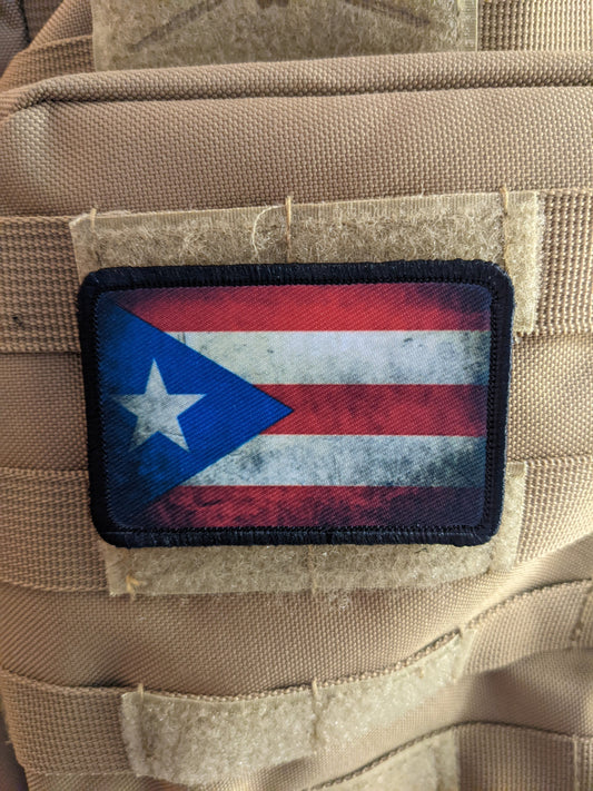 distressed flag of Puerto Rico worn 2"x3" morale patch with hook and loop backing
