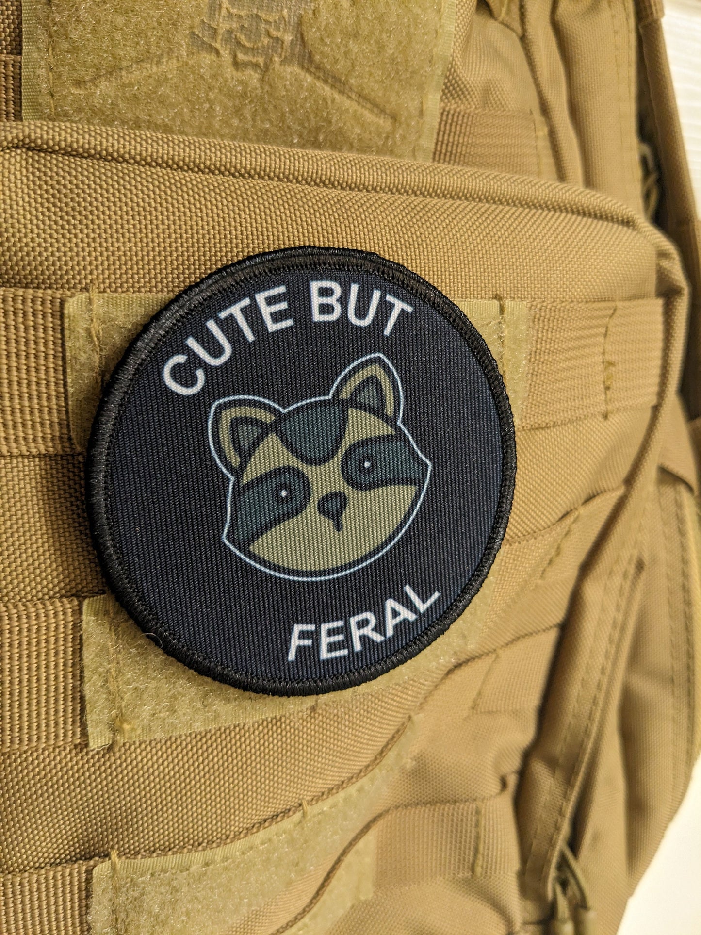 Cute but feral raccoon meme 3" circle removable morale patch with hook and loop backing