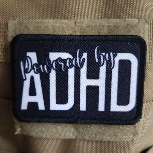 Powered by ADHD meme  2"x3" morale patch with hook and loop backing