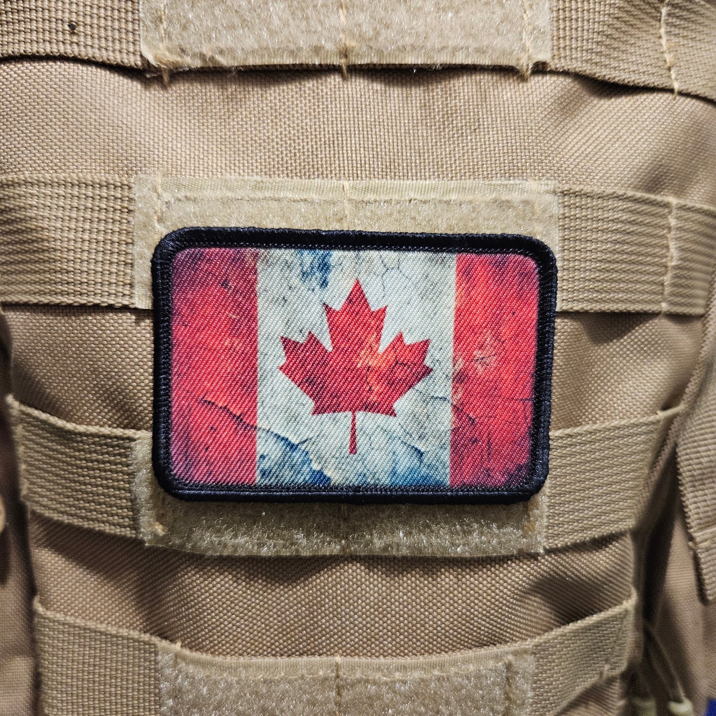 Distressed Canadian maple leaf flag 2"x3" morale patch with hook and loop backing