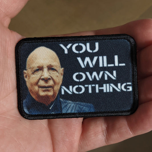 Klaus Schwab you will own nothing 2"x3" morale patch with hook and loop backing