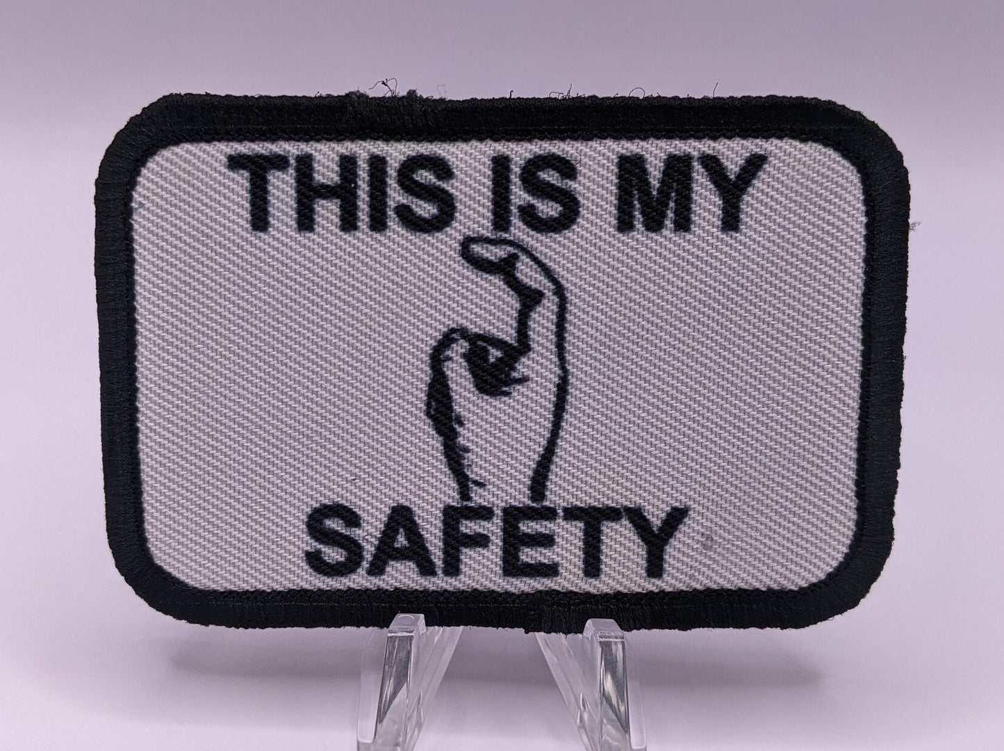This is my Safety sir white 2"x3" morale patch with hook and loop backing