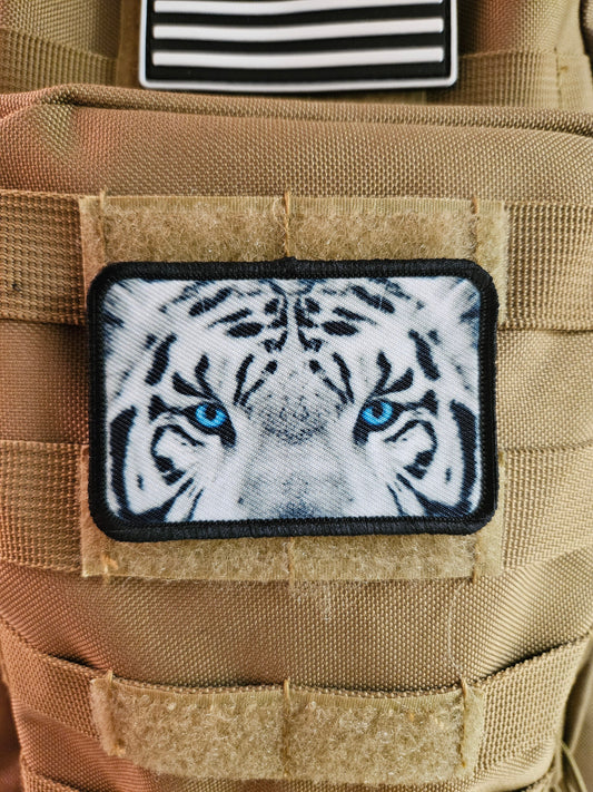 White tiger eyes 2"x3" morale patch with hook and loop backing
