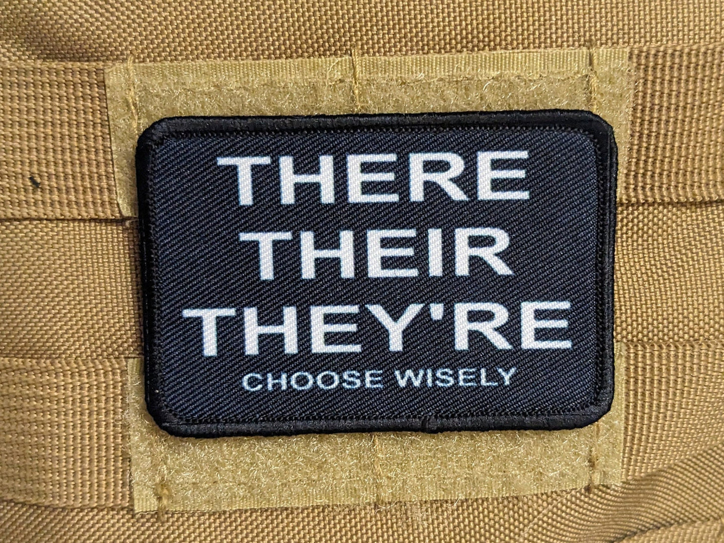 There their they're choose wisely grammar meme  2"x3" morale patch with hook and loop backing