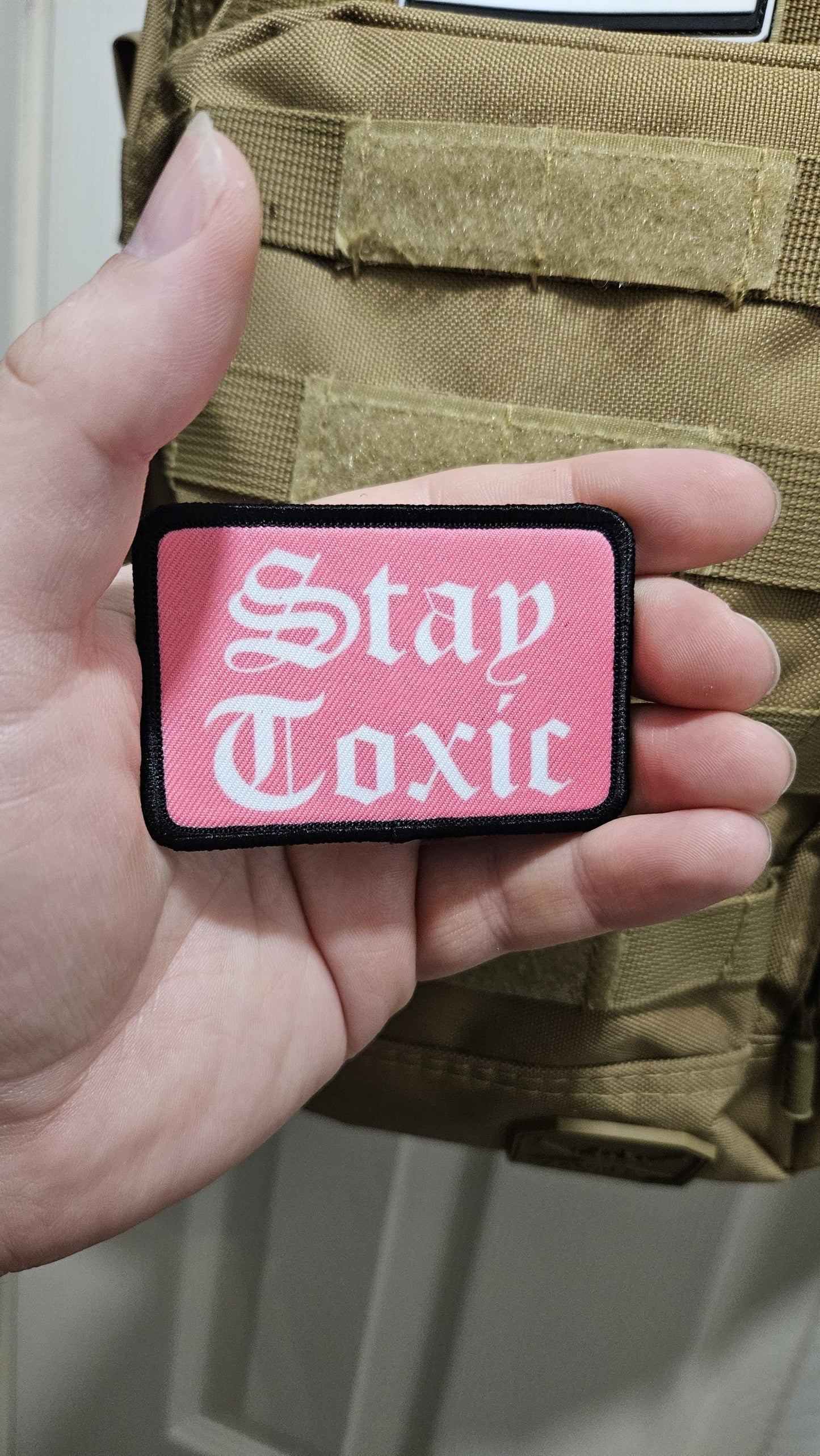 Stay toxic meme  pink and white 2"x3" removable morale patch with hook and loop backing