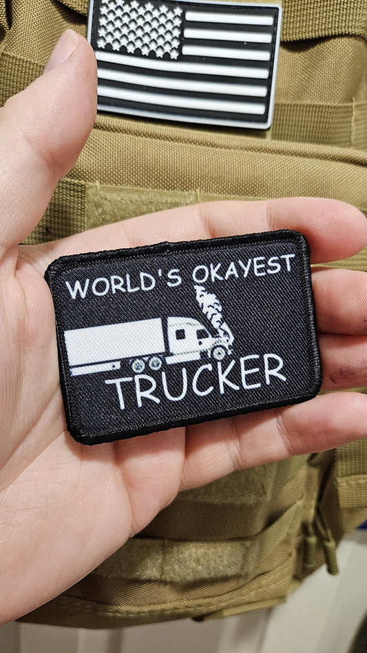 World's okayest trucker blue collar 2"x3" morale patch with hook and loop backing
