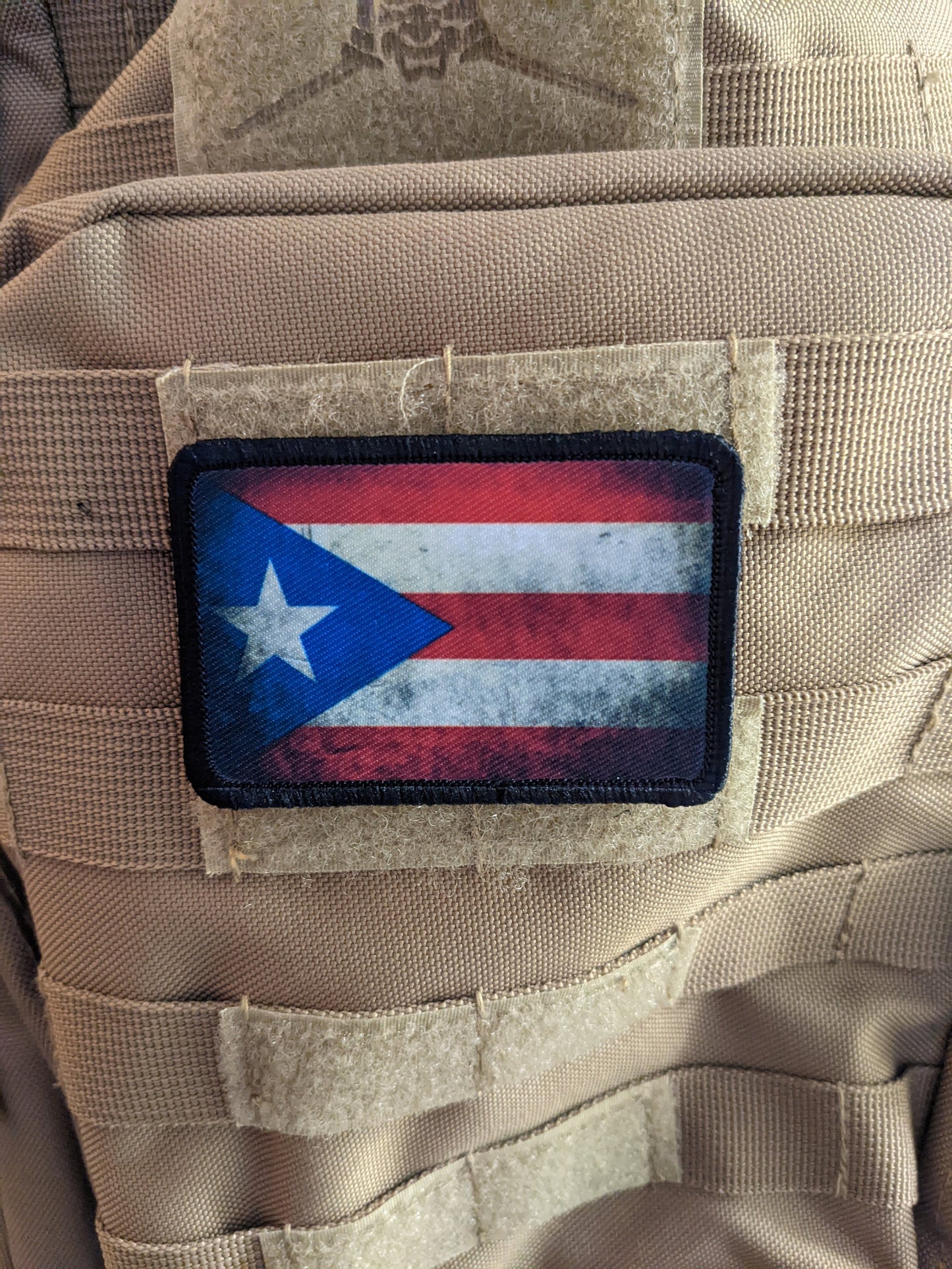distressed flag of Puerto Rico worn 2"x3" morale patch with hook and loop backing
