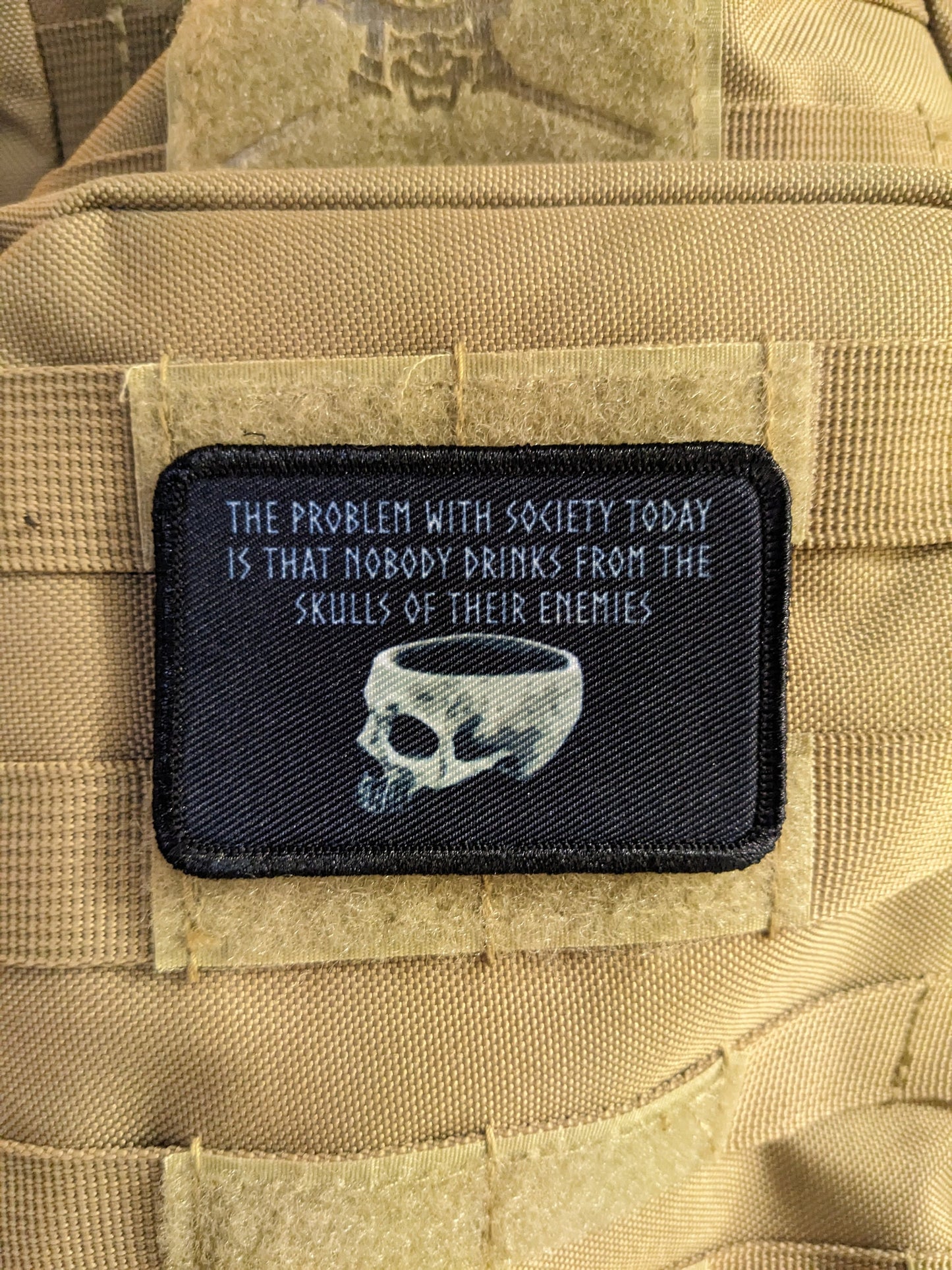 The problem with society today is that nobody drinks from the skulls of their enemies 2"x3" morale patch with hook and loop backing