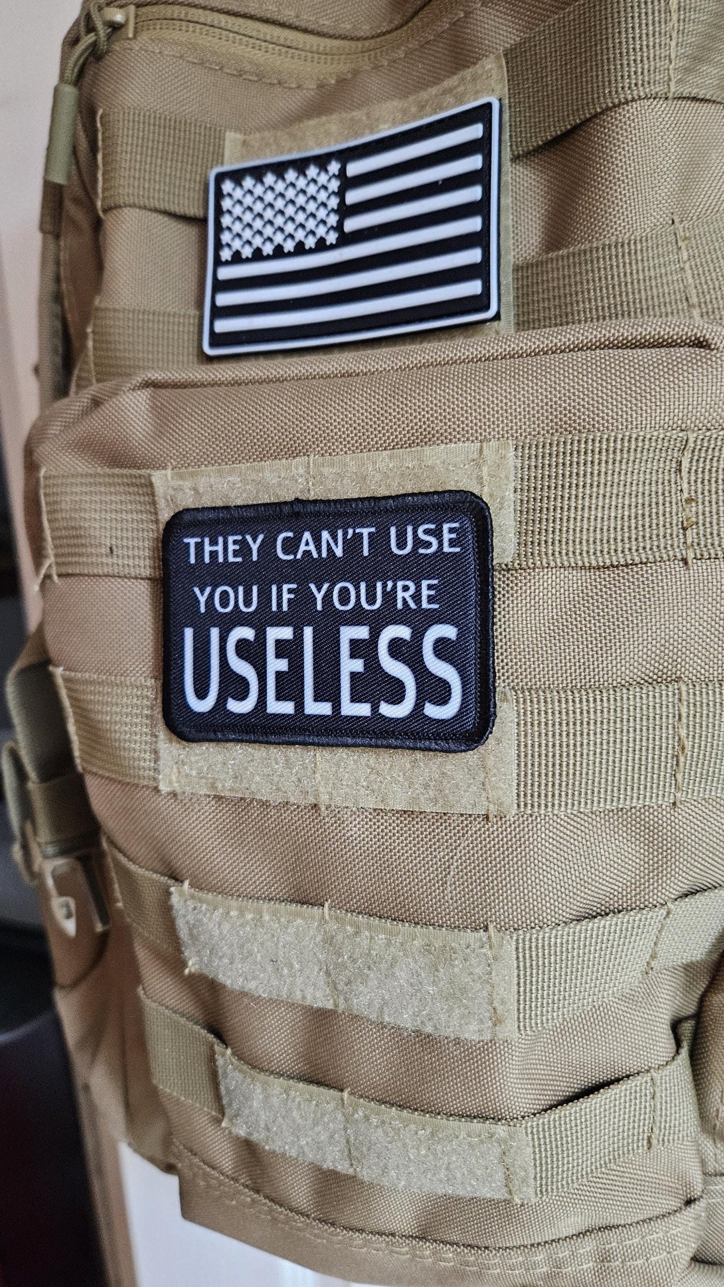 They cant use you if you're useless meme 2"x3" removable morale patch with hook and loop backing black and white