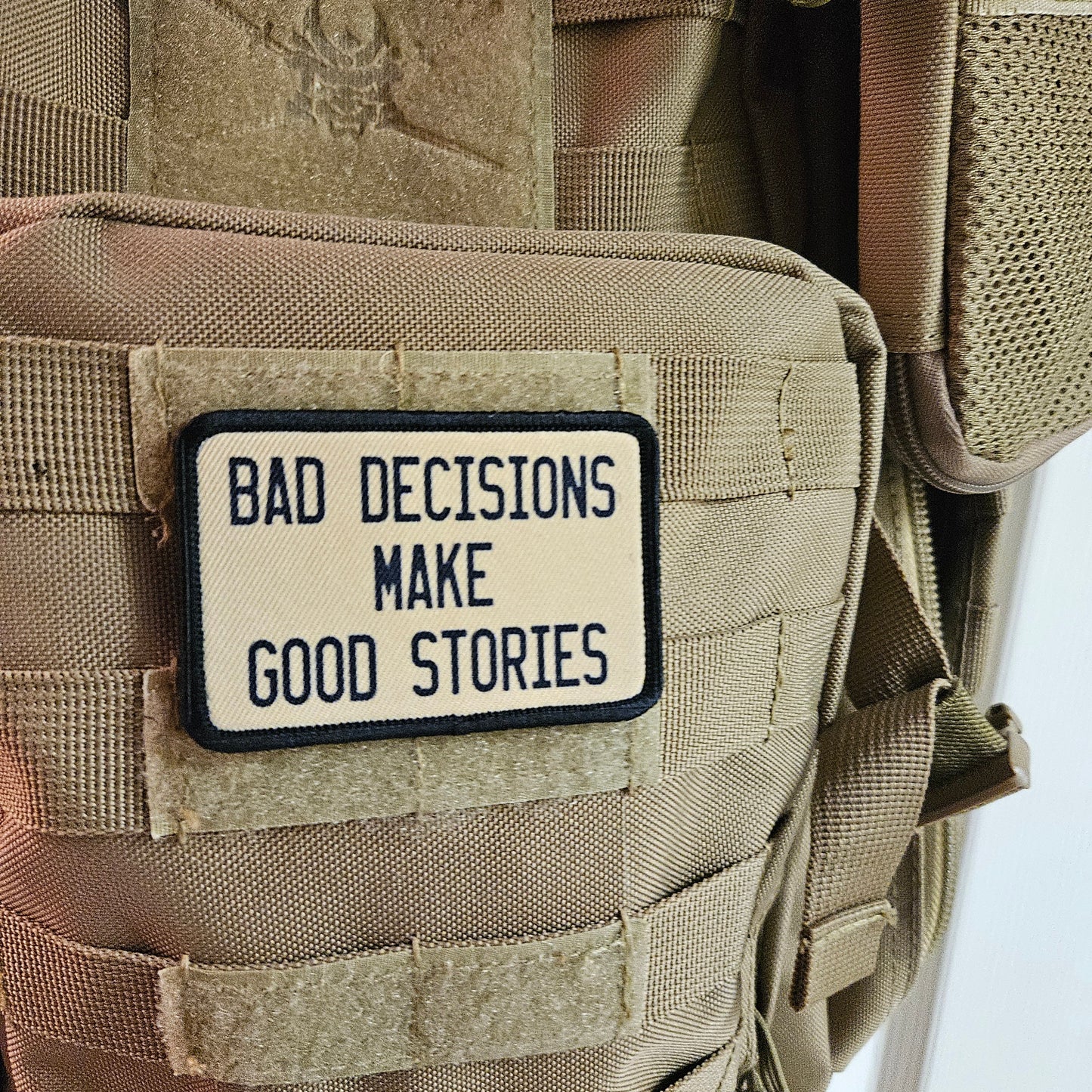 Bad decisions make good stories funny meme  2"x3" removable morale patch with hook and loop backing tan