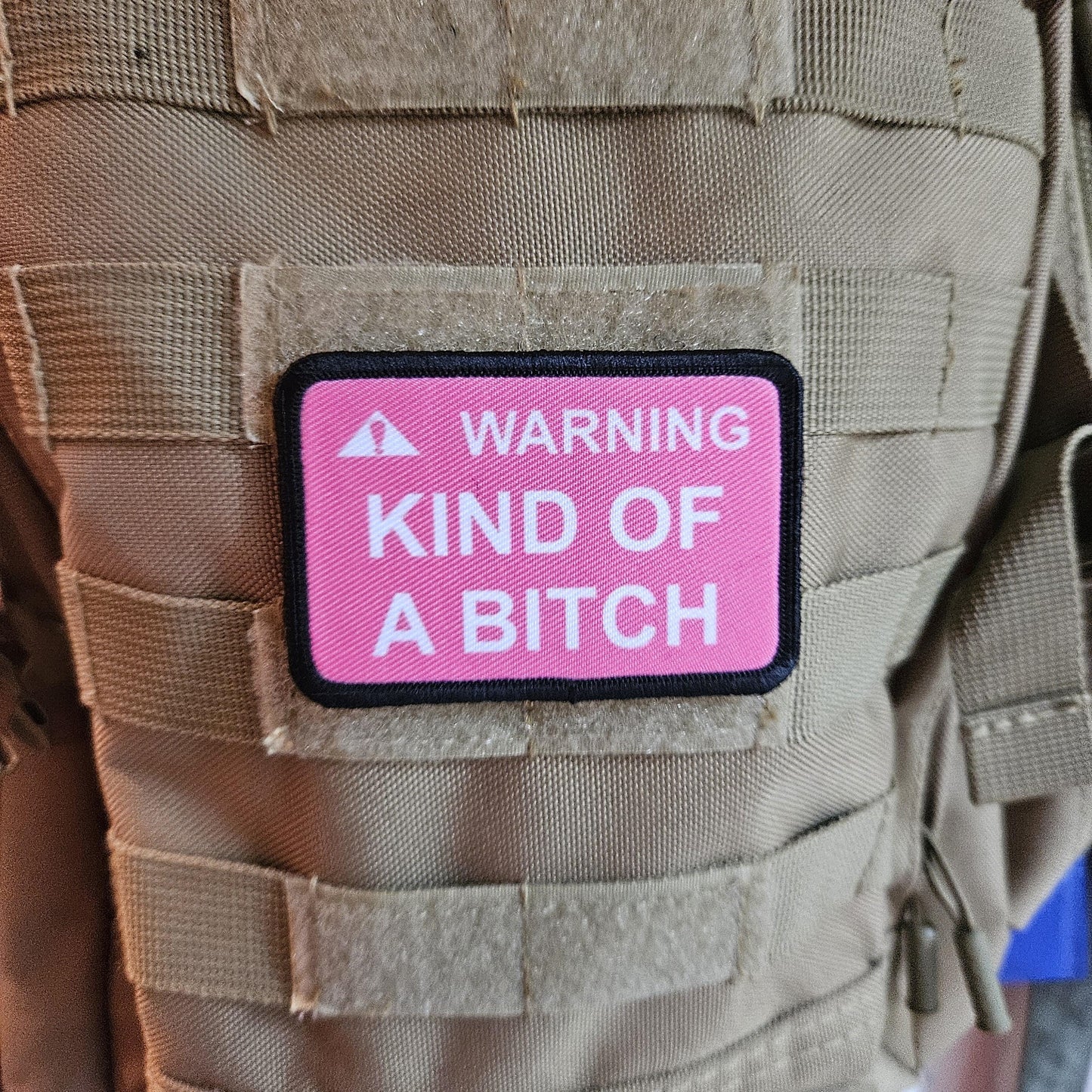 Warning kind of a bitch patch 2"x3" removable morale patch with hook and loop backing pink