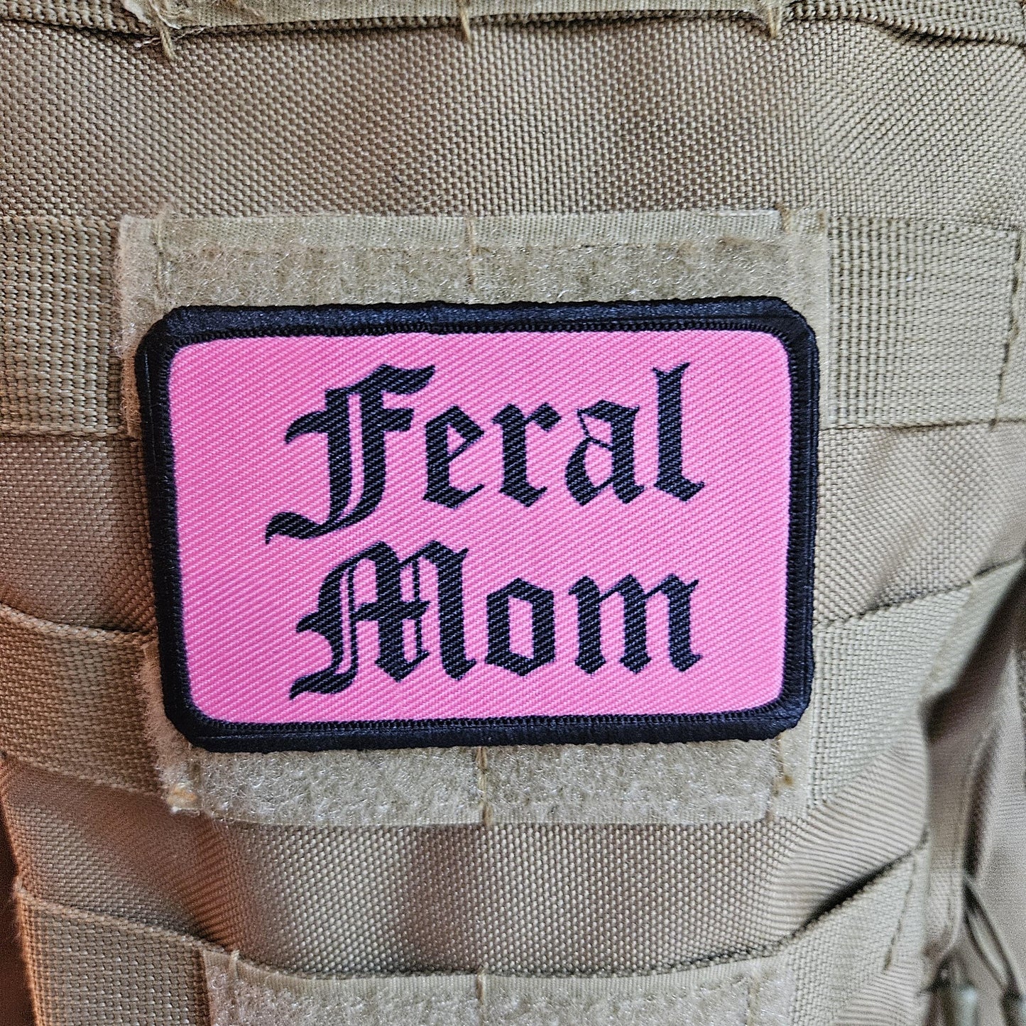 Pink "feral mom" girls and boys meme 2"x3" morale patch with hook and loop backing