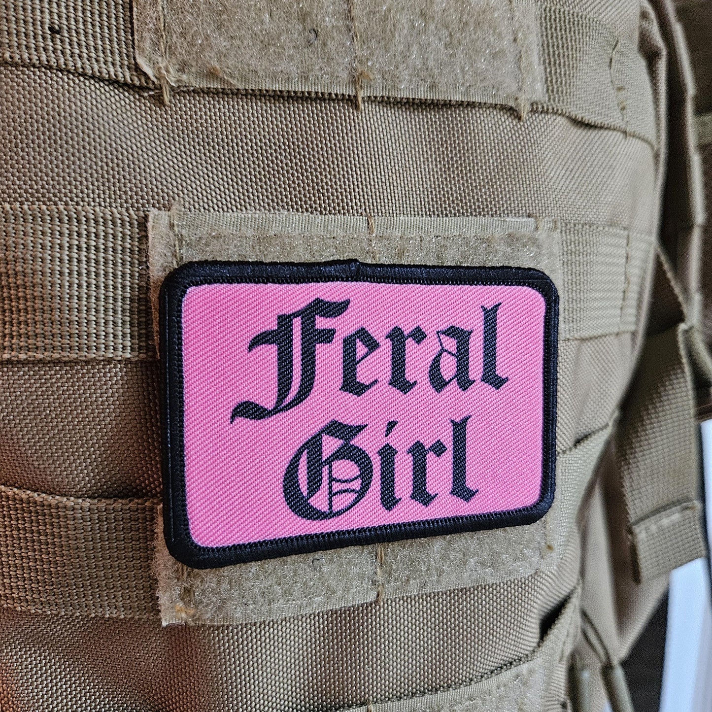 Pink "feral girl" girls and boys meme 2"x3" morale patch with hook and loop backing