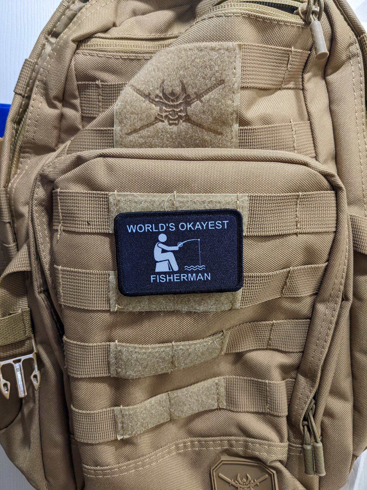 World's Okayest fisherman funny meme 2"x3" morale patch with hook and loop backing