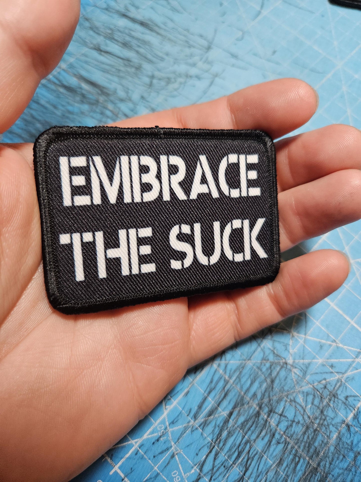 EMBRACE THE SUCK army military navy funny 2"x3" morale patch with hook and loop backing green background