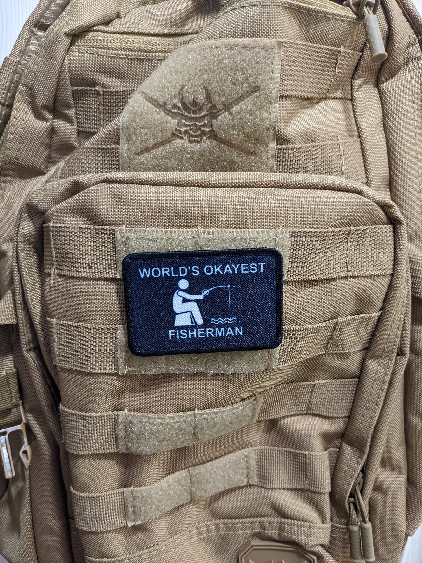 World's Okayest fisherman funny meme 2"x3" morale patch with hook and loop backing
