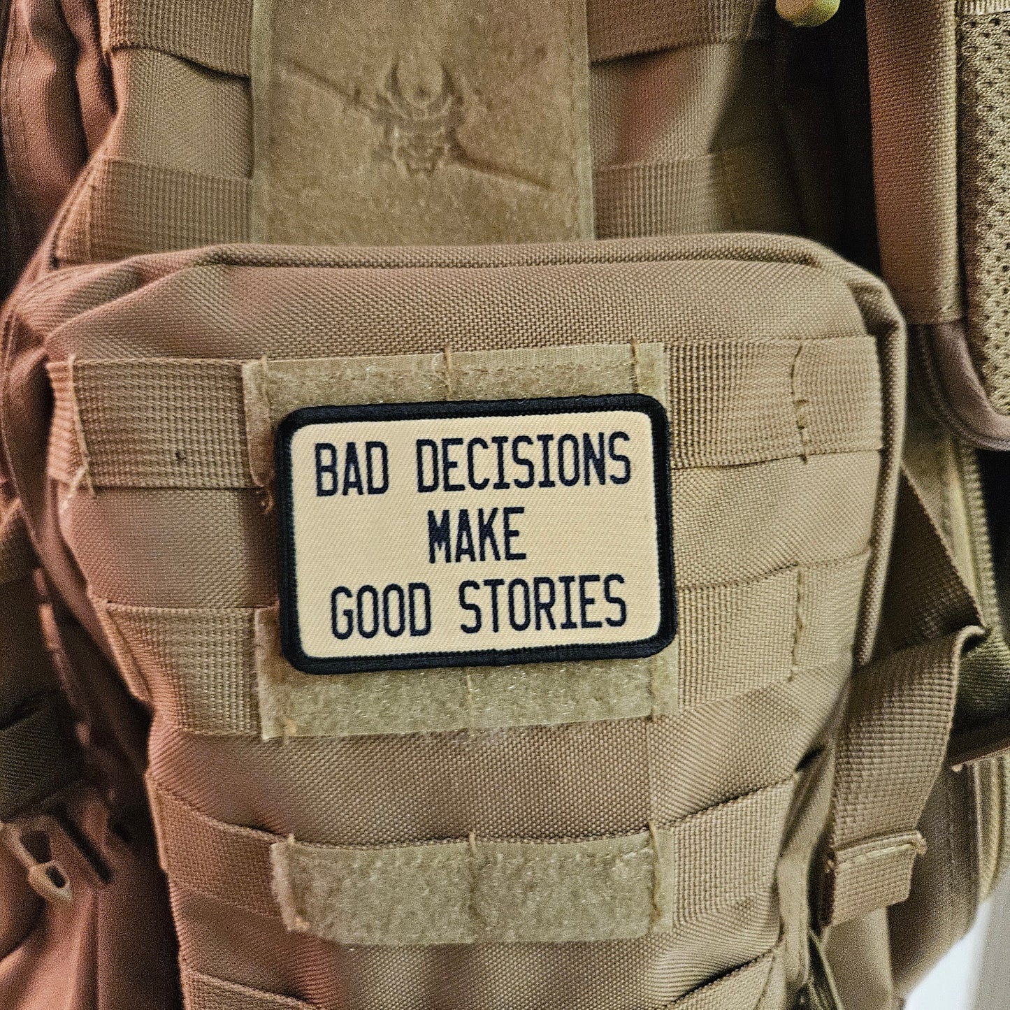 Bad decisions make good stories funny meme  2"x3" removable morale patch with hook and loop backing tan