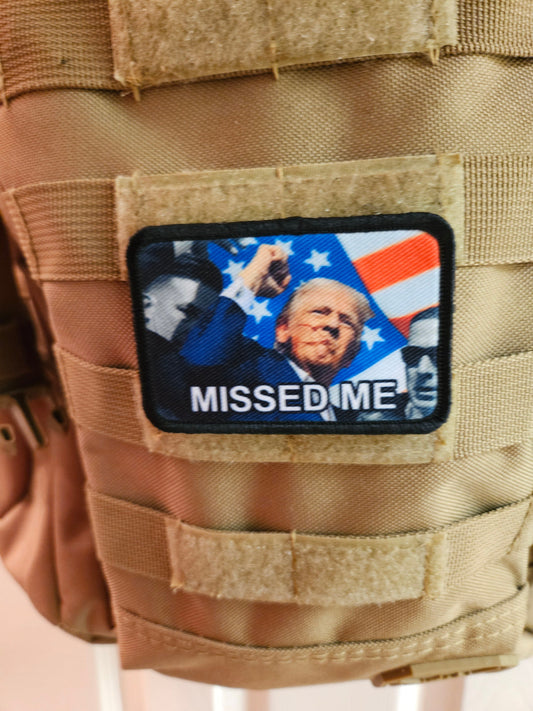 trump survived Flag background fist in the air missed me  2"x3" morale patch with hook and loop backing military joke meme