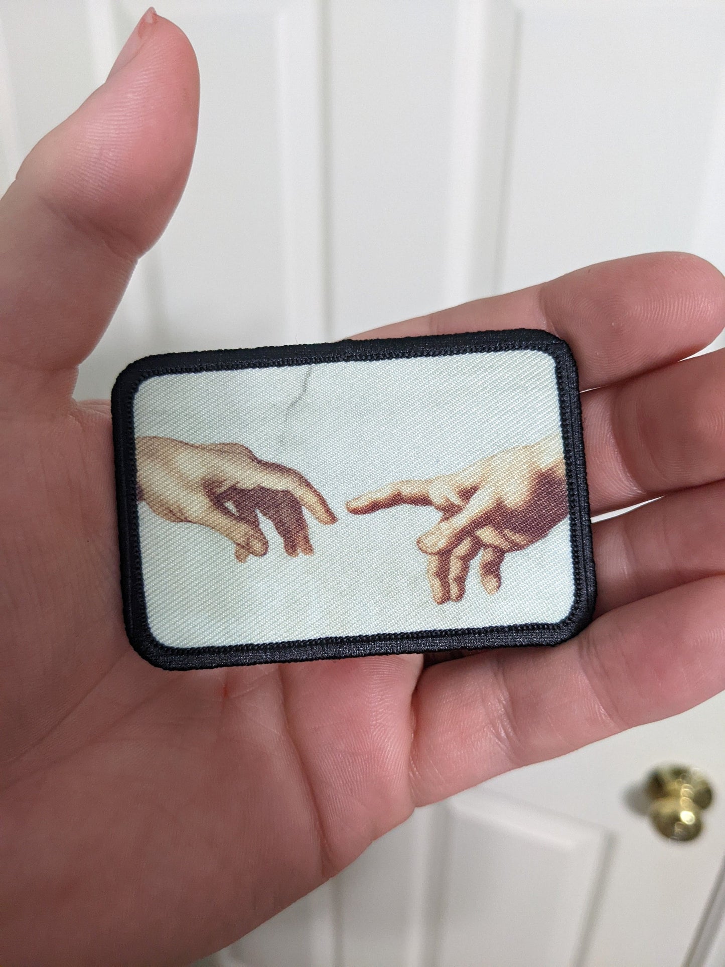 The creation of Adam  Michelangelo Renaissance art 2"x3" morale patch with hook and loop backing