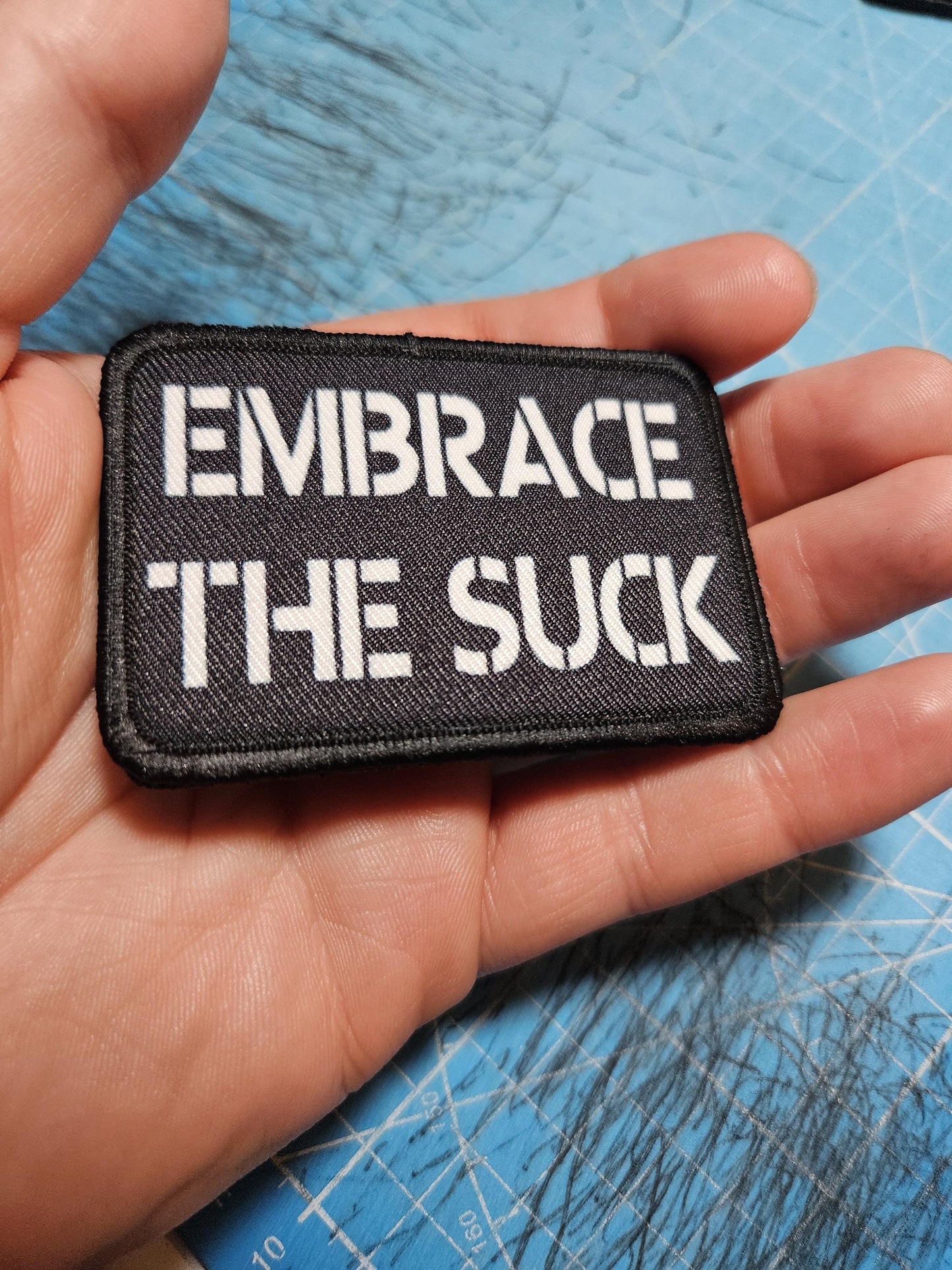 EMBRACE THE SUCK army military navy funny 2"x3" morale patch with hook and loop backing green background