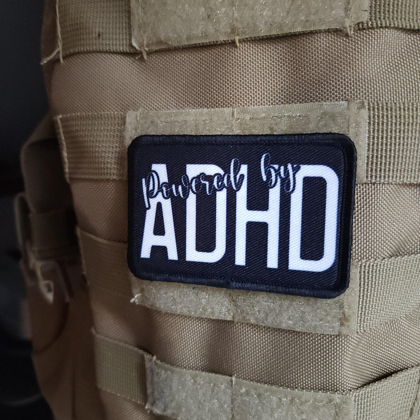 Powered by ADHD meme  2"x3" morale patch with hook and loop backing