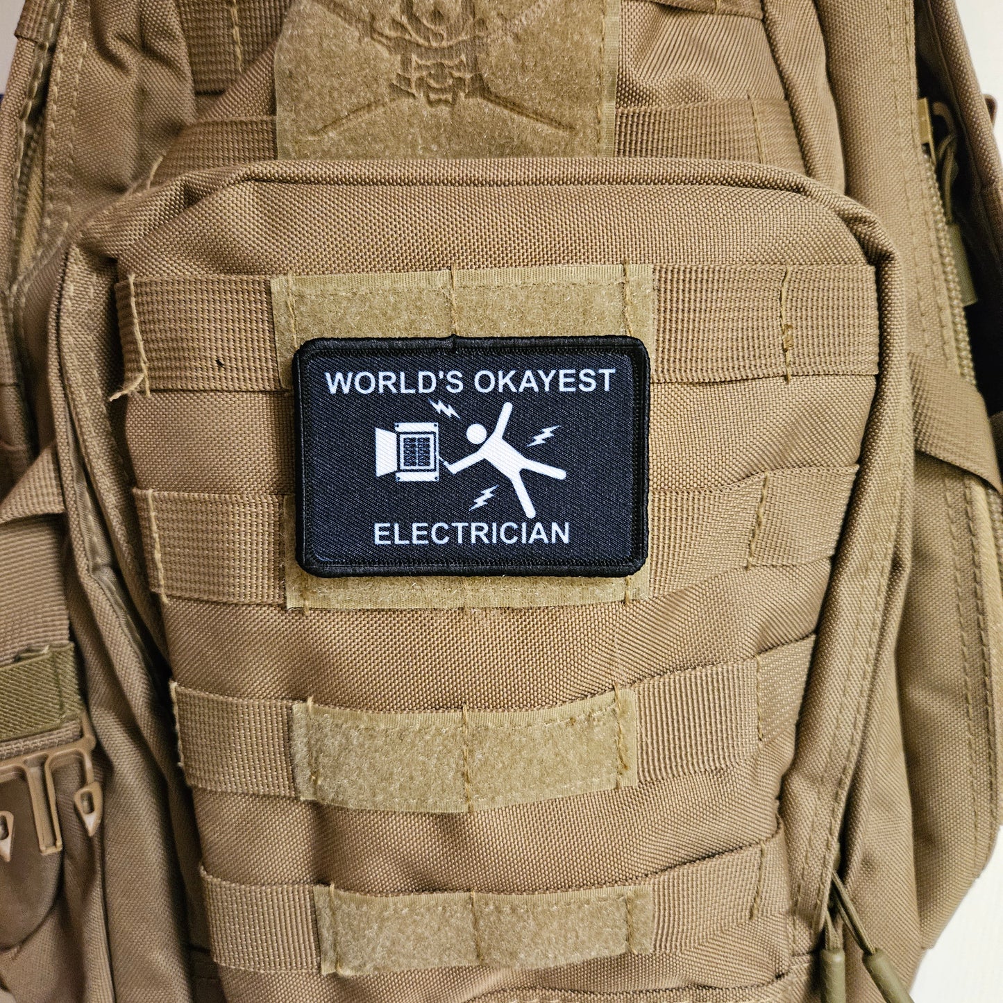 World's okayest electrician blue collar 2"x3" morale patch with hook and loop backing