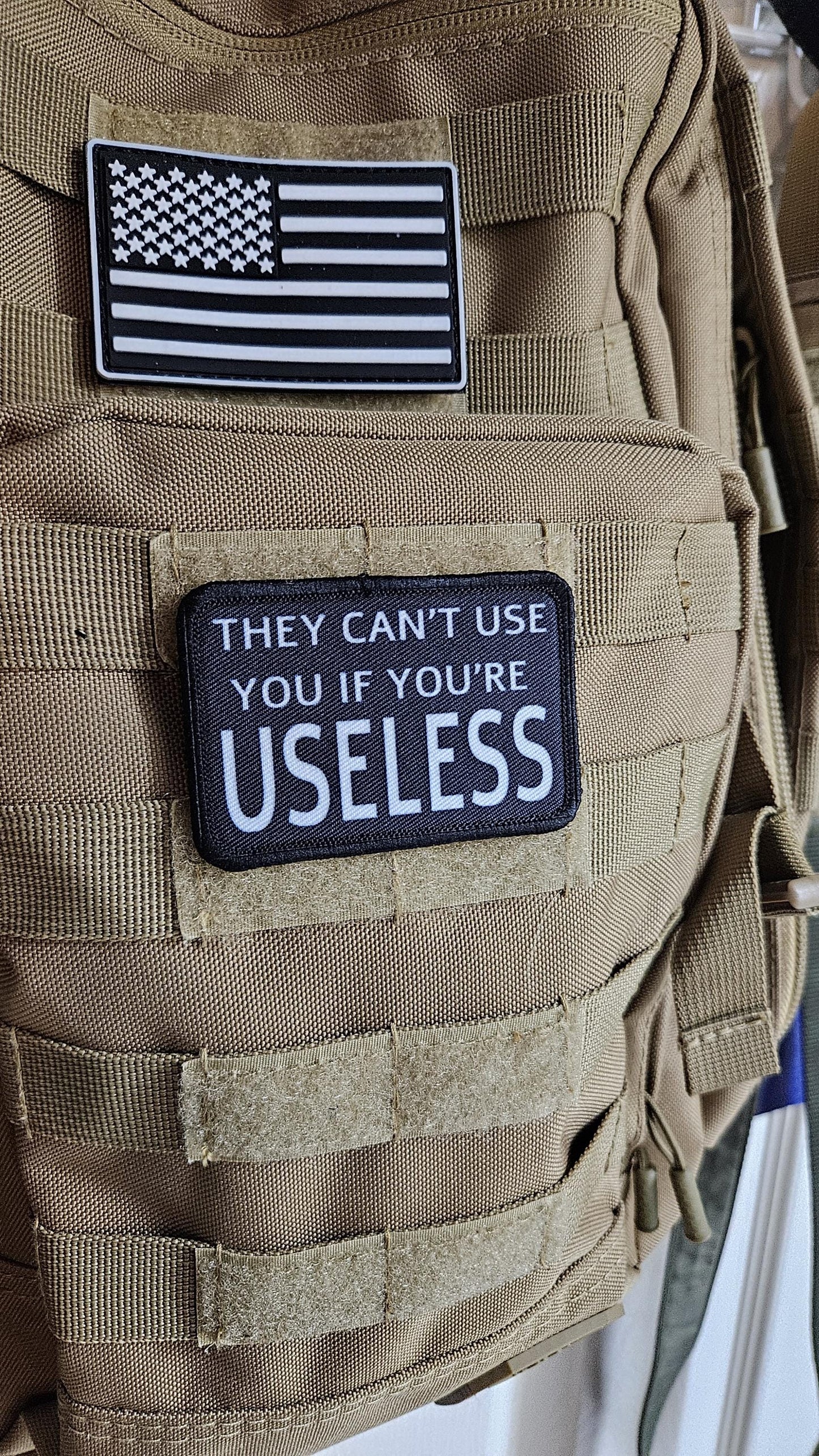 They cant use you if you're useless meme 2"x3" removable morale patch with hook and loop backing black and white