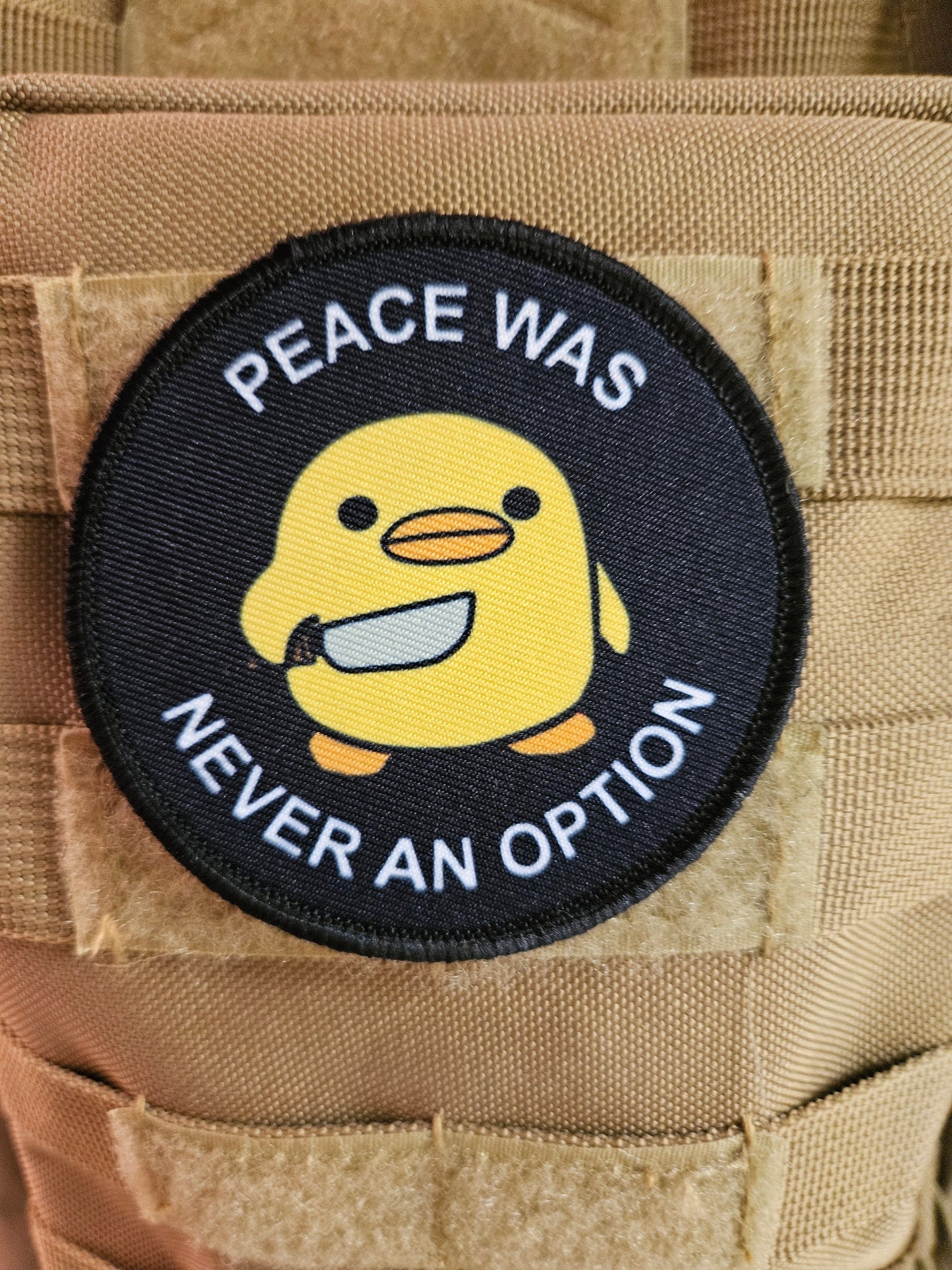 Peace was never an option duckling  with knife  meme 3" circle removable morale patch with hook and loop backing