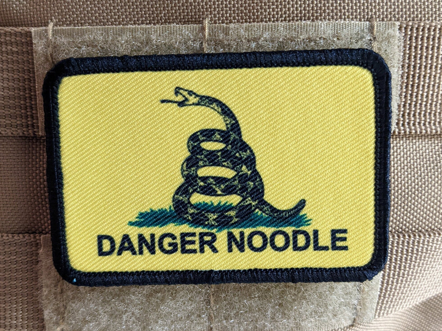 Danger noodle Gadsden flag meme  2"x3" removable morale patch with hook and loop backing