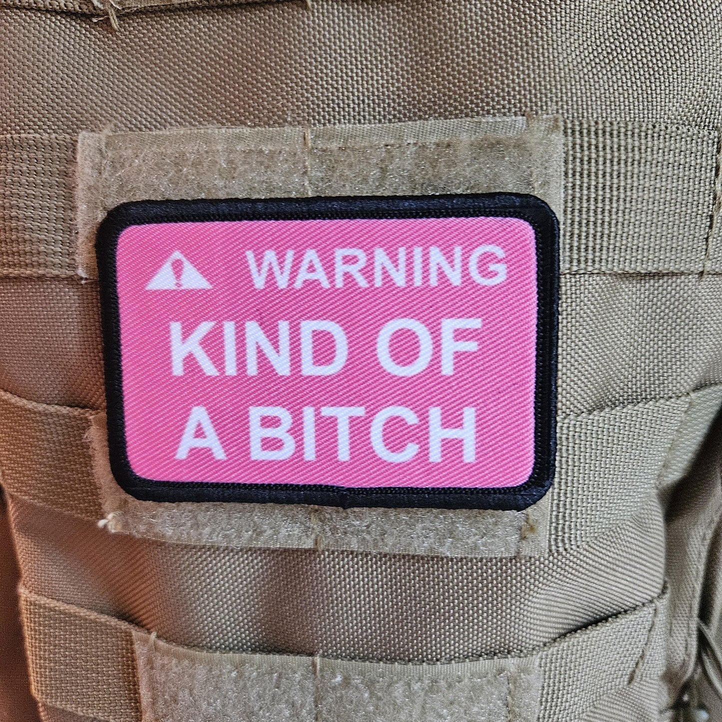 Warning kind of a bitch patch 2"x3" removable morale patch with hook and loop backing pink