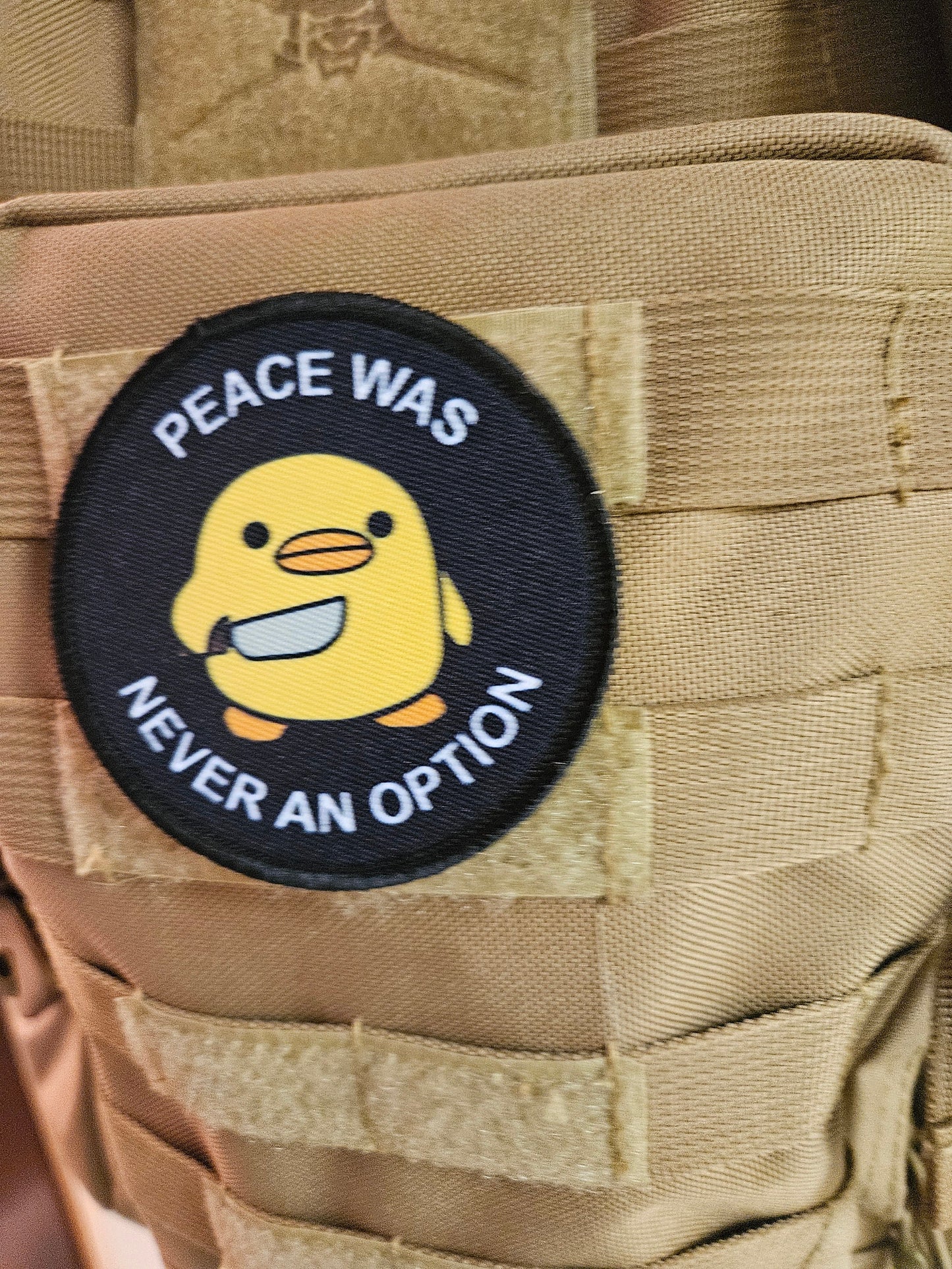 Peace was never an option duckling  with knife  meme 3" circle removable morale patch with hook and loop backing