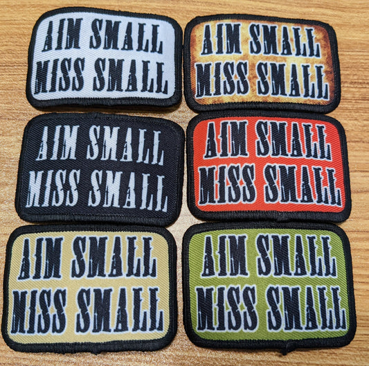 Aim Small Miss Small Patriot quote 2"x3" removable morale patch with hook and loop backing