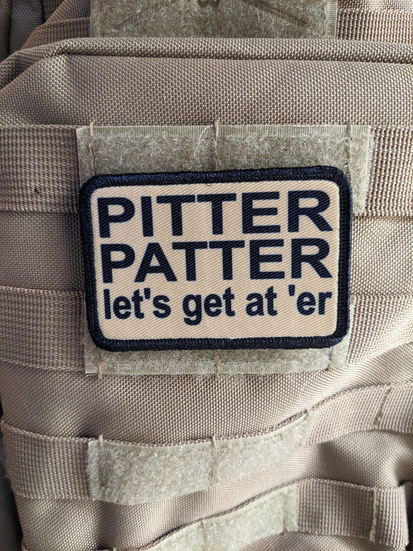 Pitter patter let's get at 'er meme 2"x3" removable morale patch with hook and loop backing