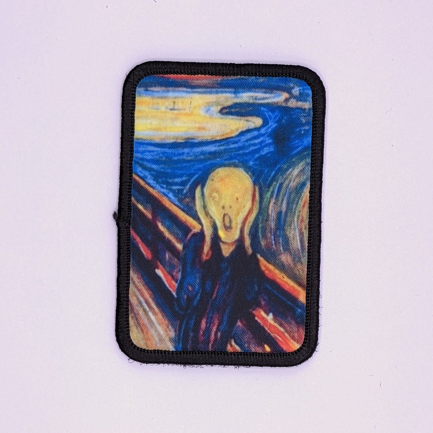 The scream 19th century art 2"x3" morale patch with hook and loop backing