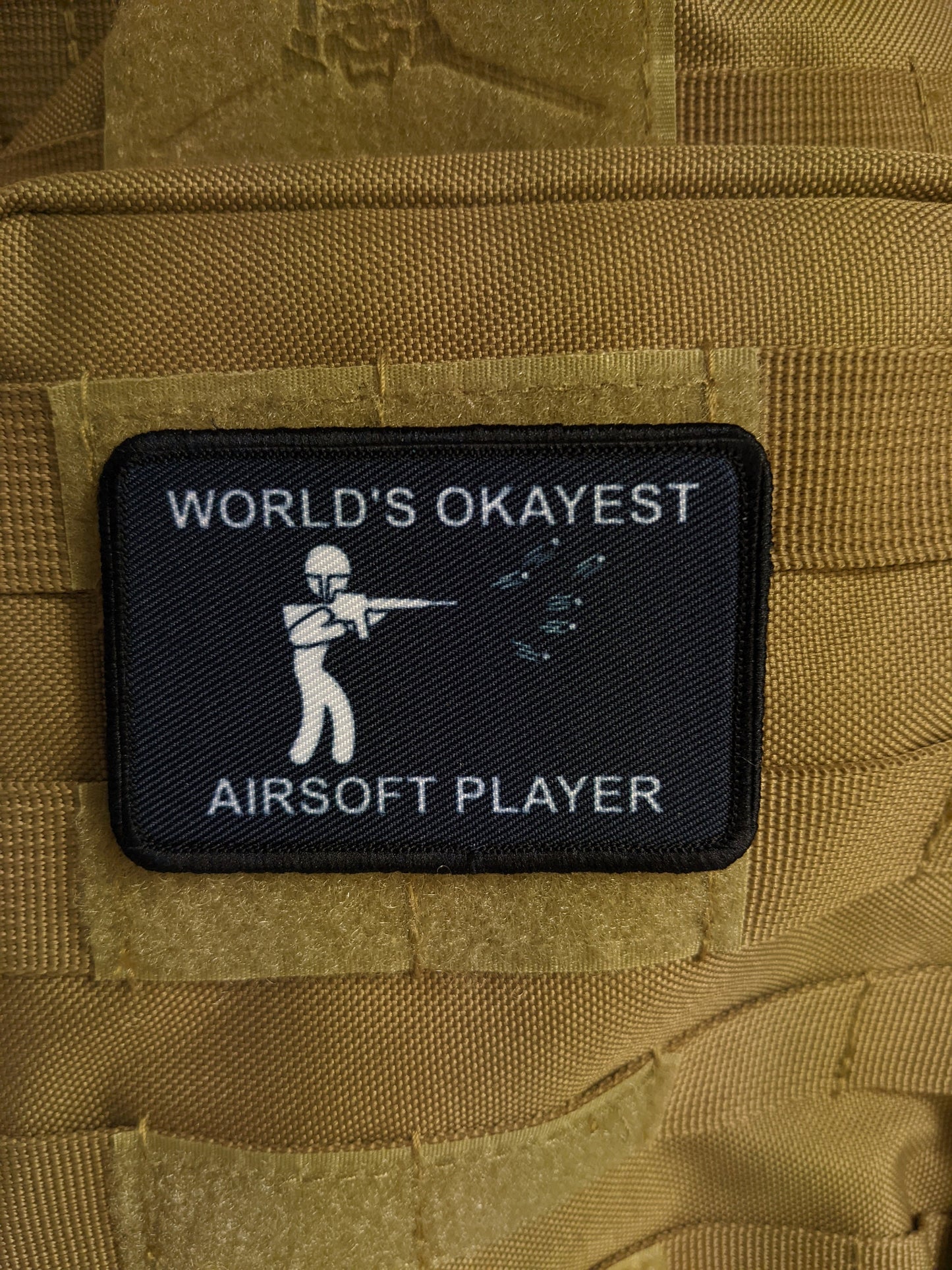 World's Okayest airsoft player funny meme 2"x3" morale patch with hook and loop backing