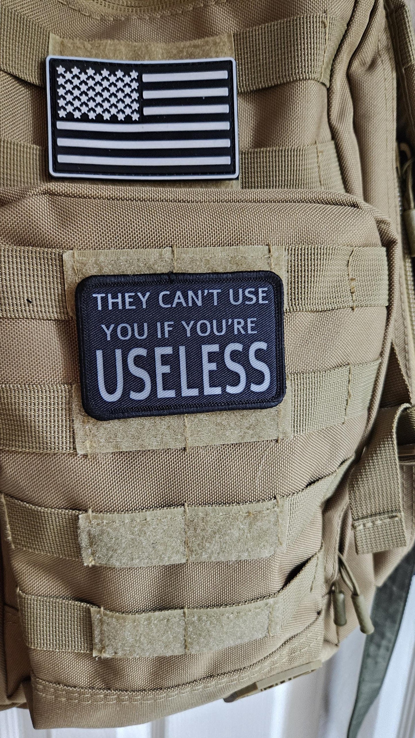 They cant use you if you're useless meme 2"x3" removable morale patch with hook and loop backing black and white