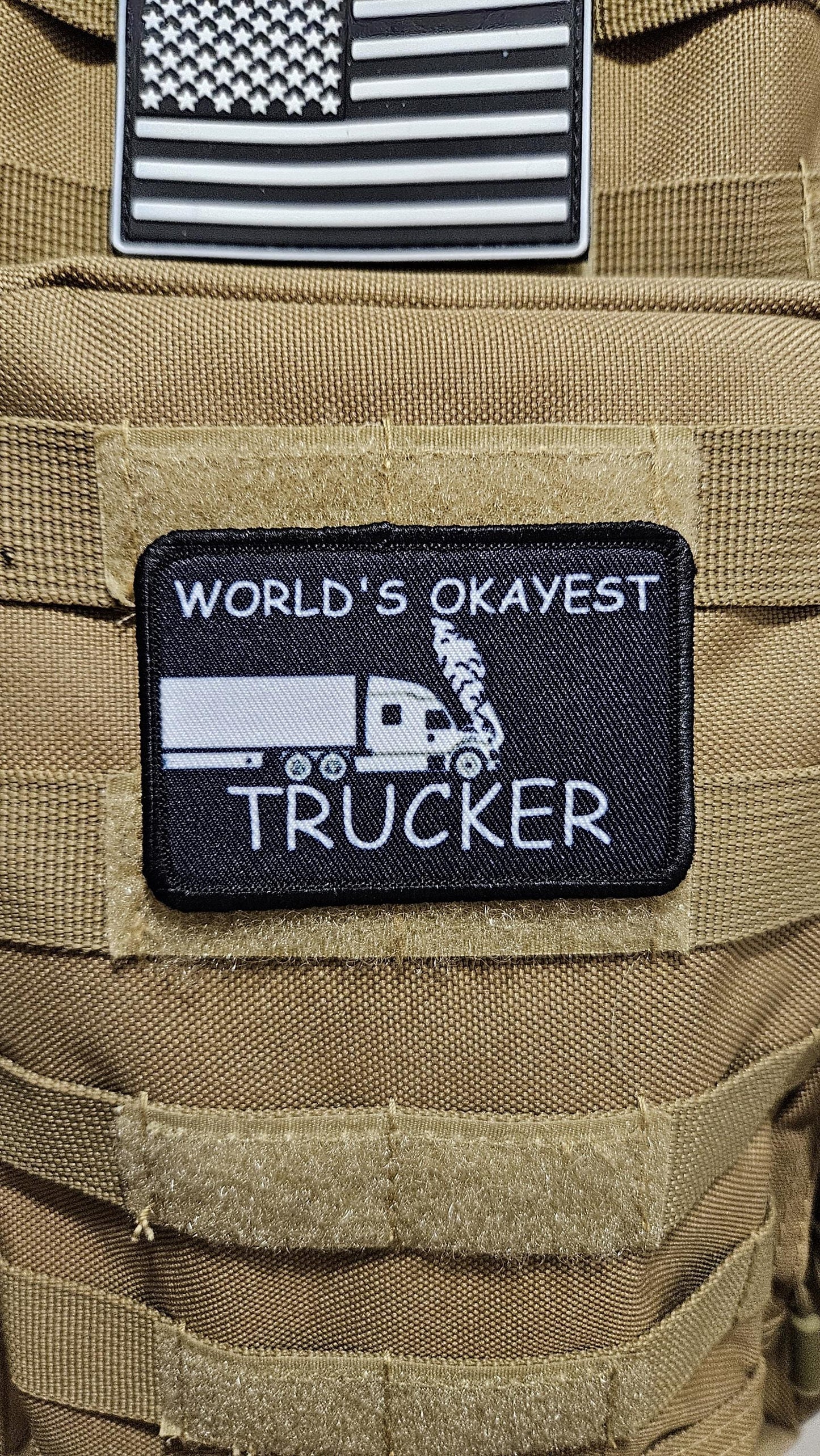 World's okayest trucker blue collar 2"x3" morale patch with hook and loop backing