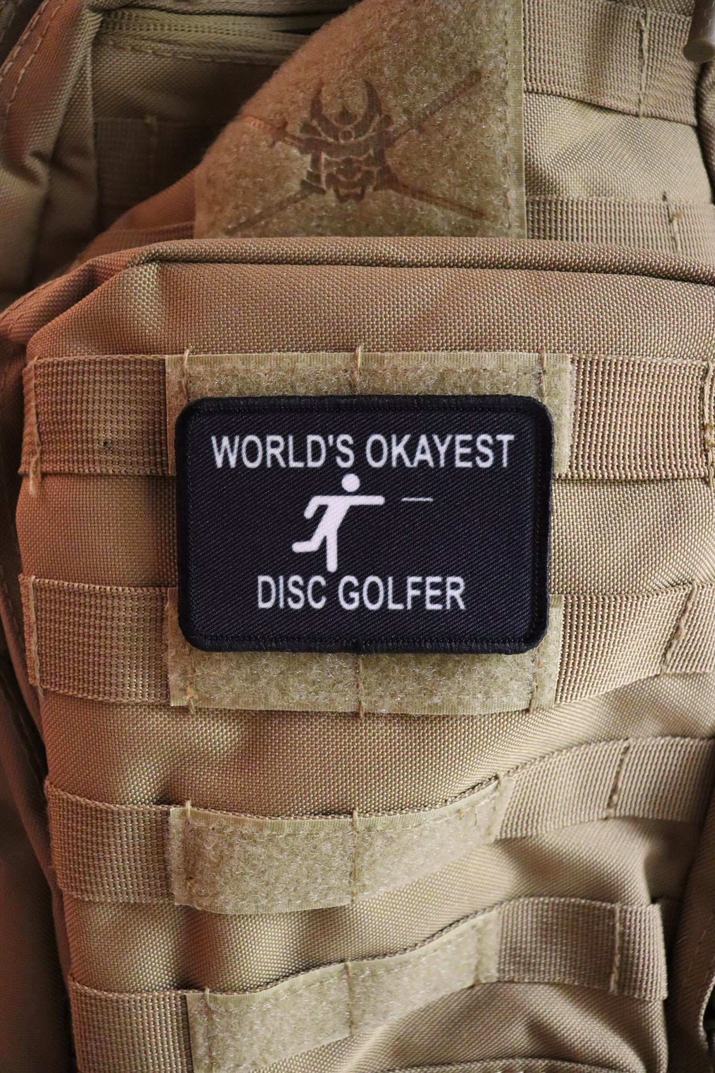 World's Okayest Disc Golfer funny meme 2"x3" morale patch with hook and loop backing