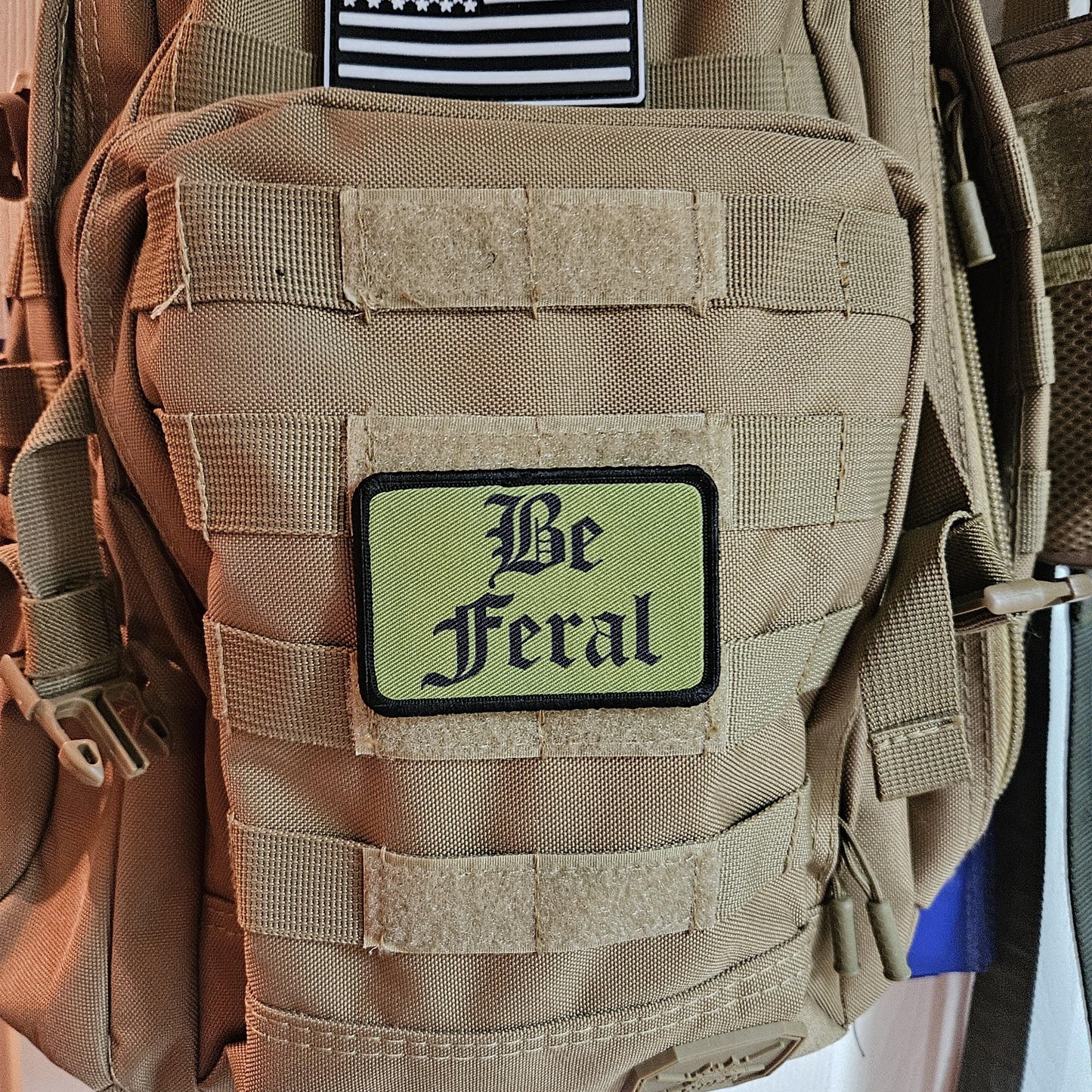 Green "be feral" girls and boys meme 2"x3" morale patch with hook and loop backing