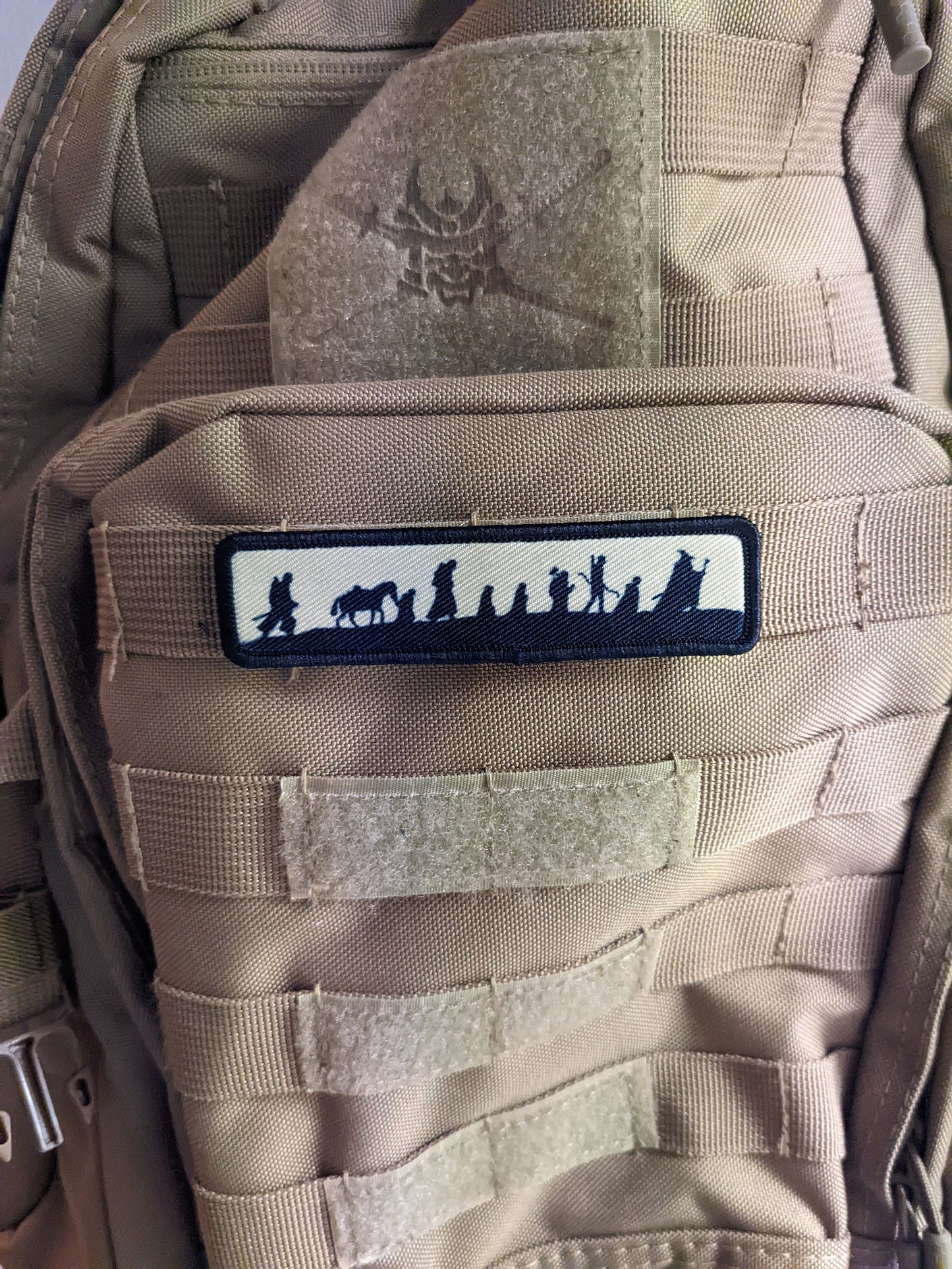 LOTR fellowship silhouette tan 1"x4" removable morale patch with hook and loop backing good for back of operator hats