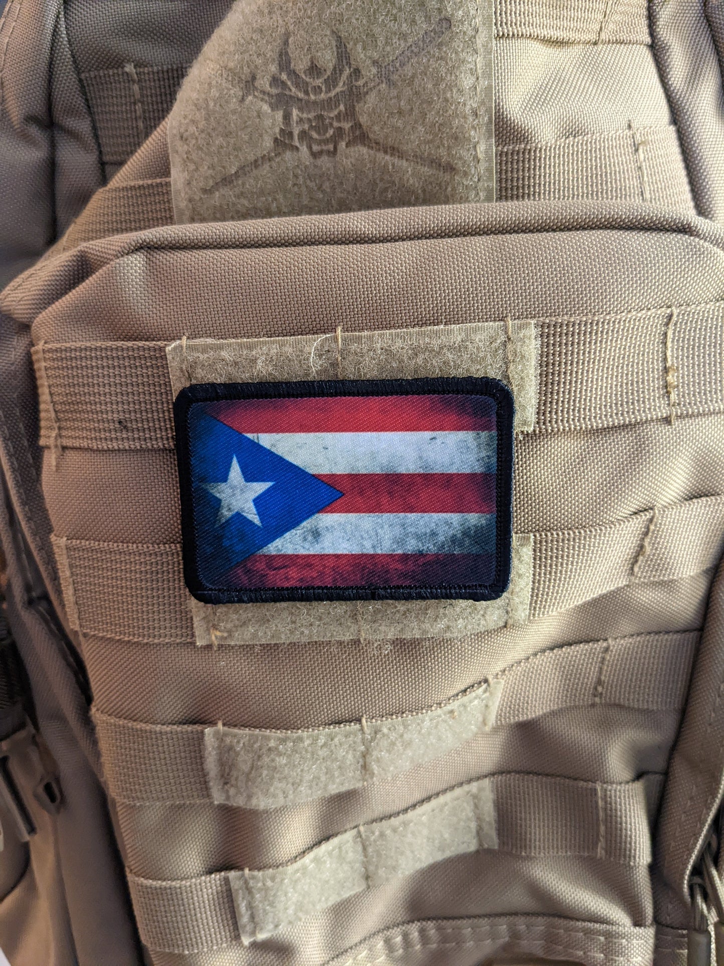 distressed flag of Puerto Rico worn 2"x3" morale patch with hook and loop backing