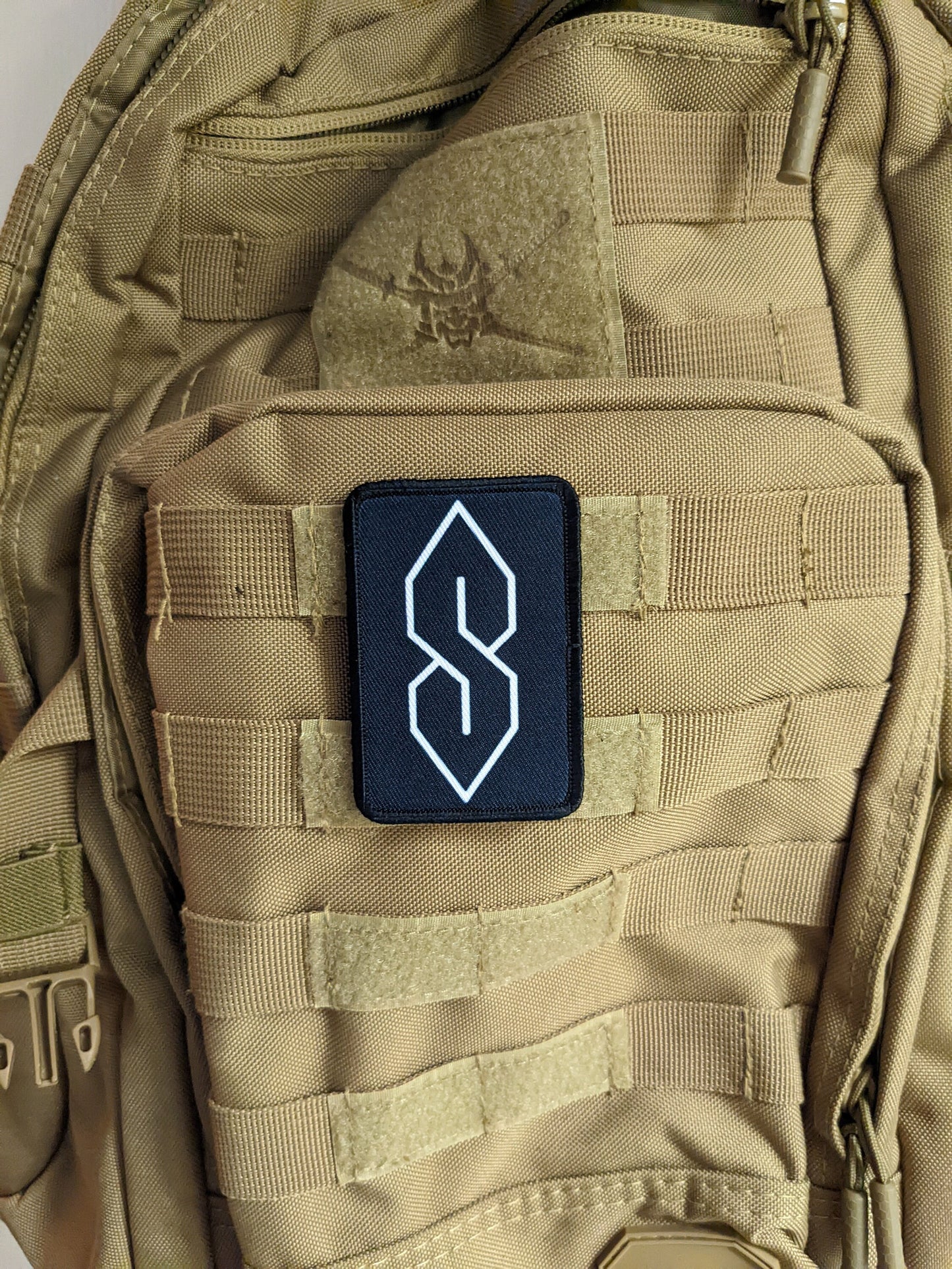 90s "S" shape drawing ancient meme knowledge 2"x3" morale patch with hook and loop backing