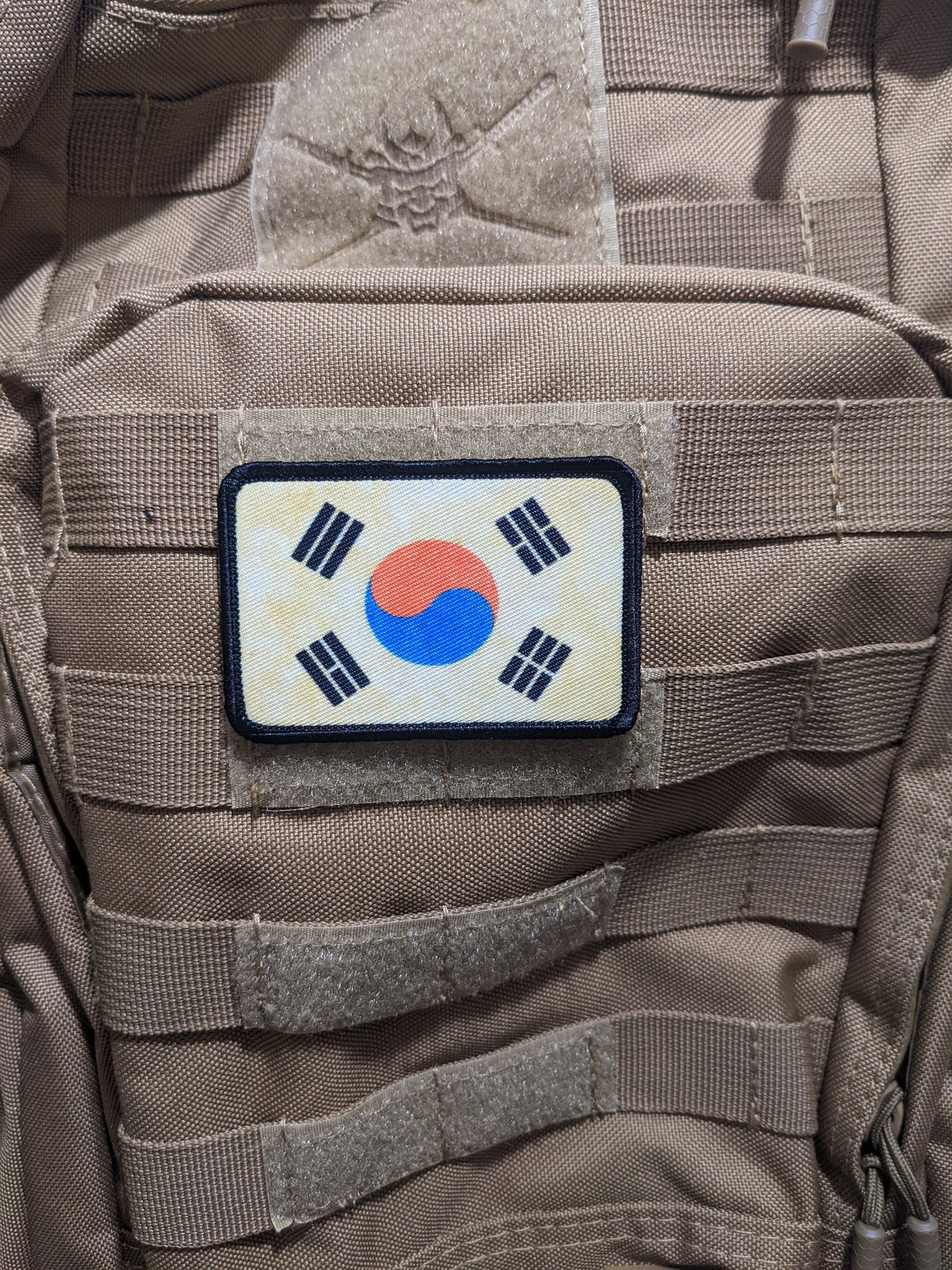 Worn/distressed South Korean flag 2"x3" morale patch with hook and loop backing