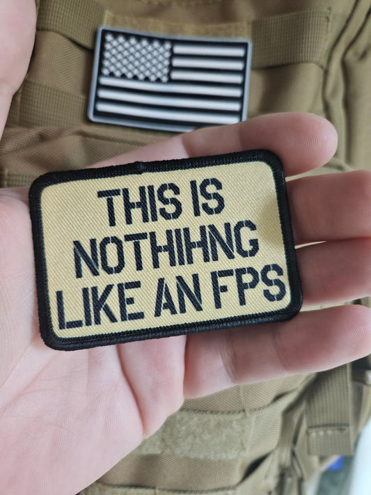 This is nothing like a first person shooter military meme 2"x3" removable morale patch with hook and loop backing