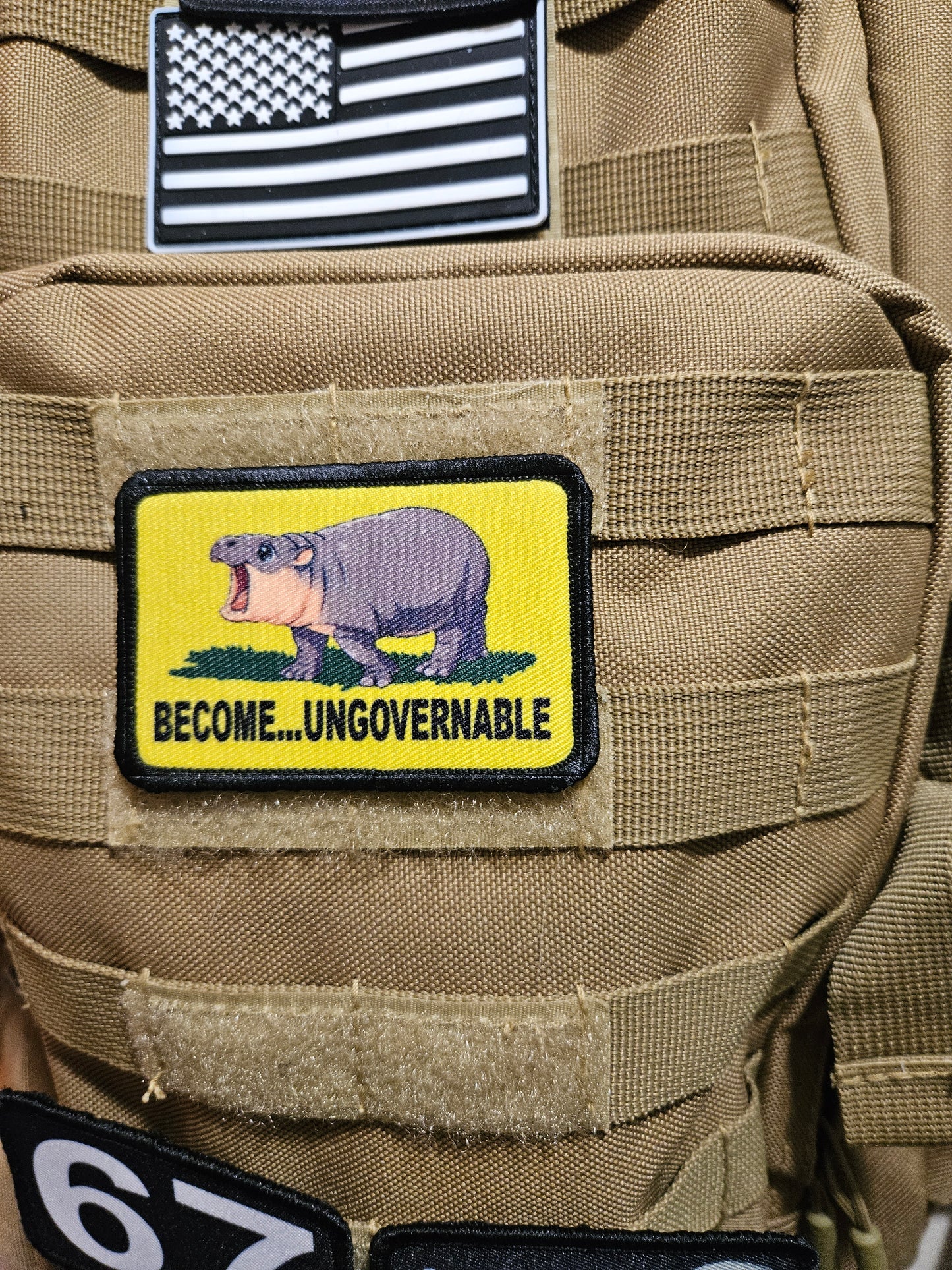 Become ungovernable baby hippo meme 2"x3" morale patch with hook and loop backing full color