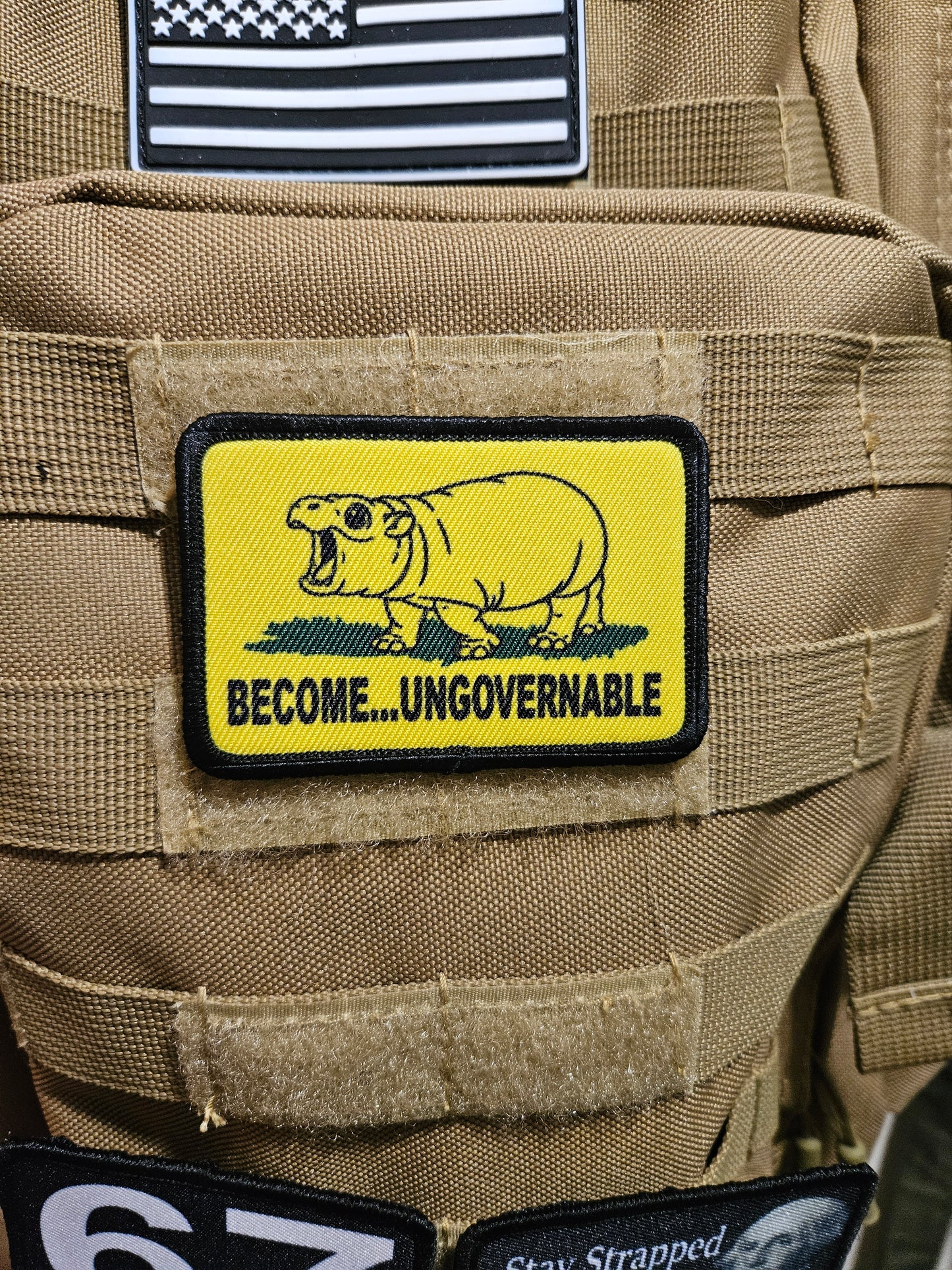 Become ungovernable baby hippo meme 2"x3" morale patch with hook and loop backing line art version