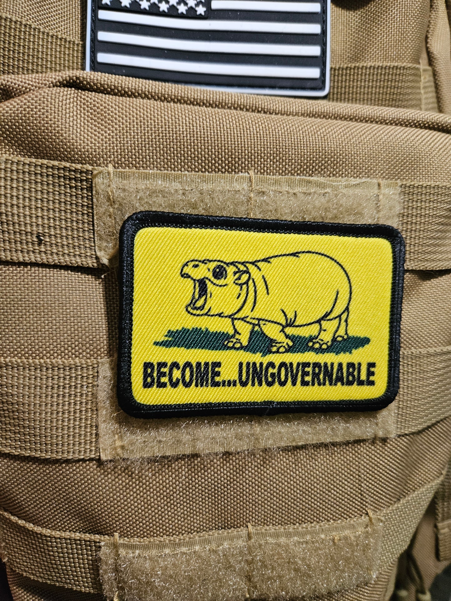 Become ungovernable baby hippo meme 2"x3" morale patch with hook and loop backing line art version