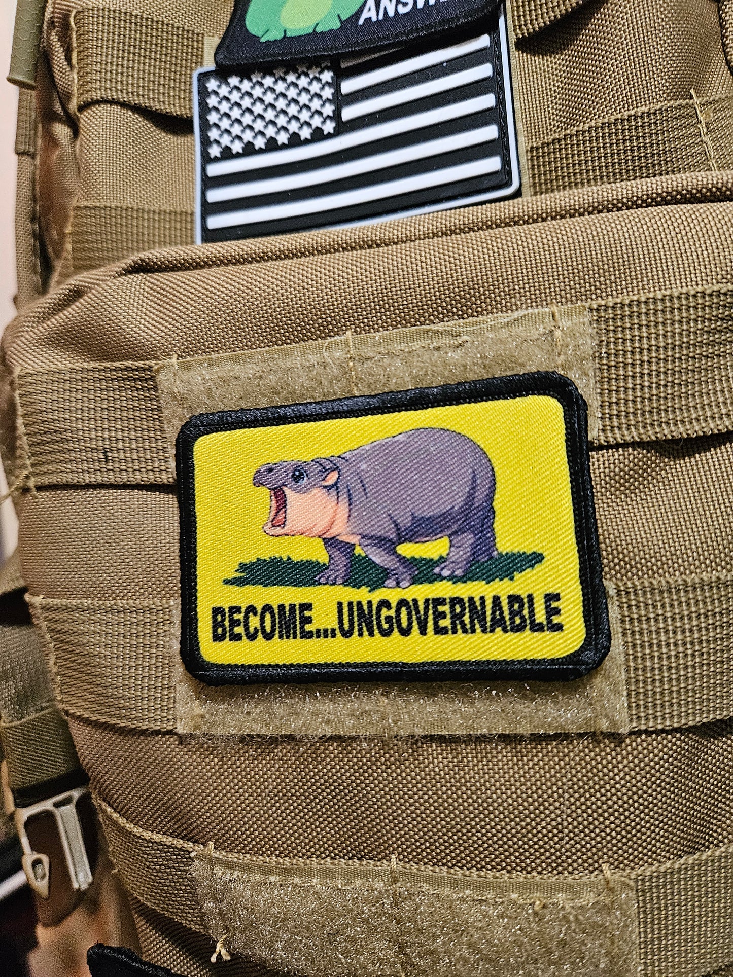 Become ungovernable baby hippo meme 2"x3" morale patch with hook and loop backing full color